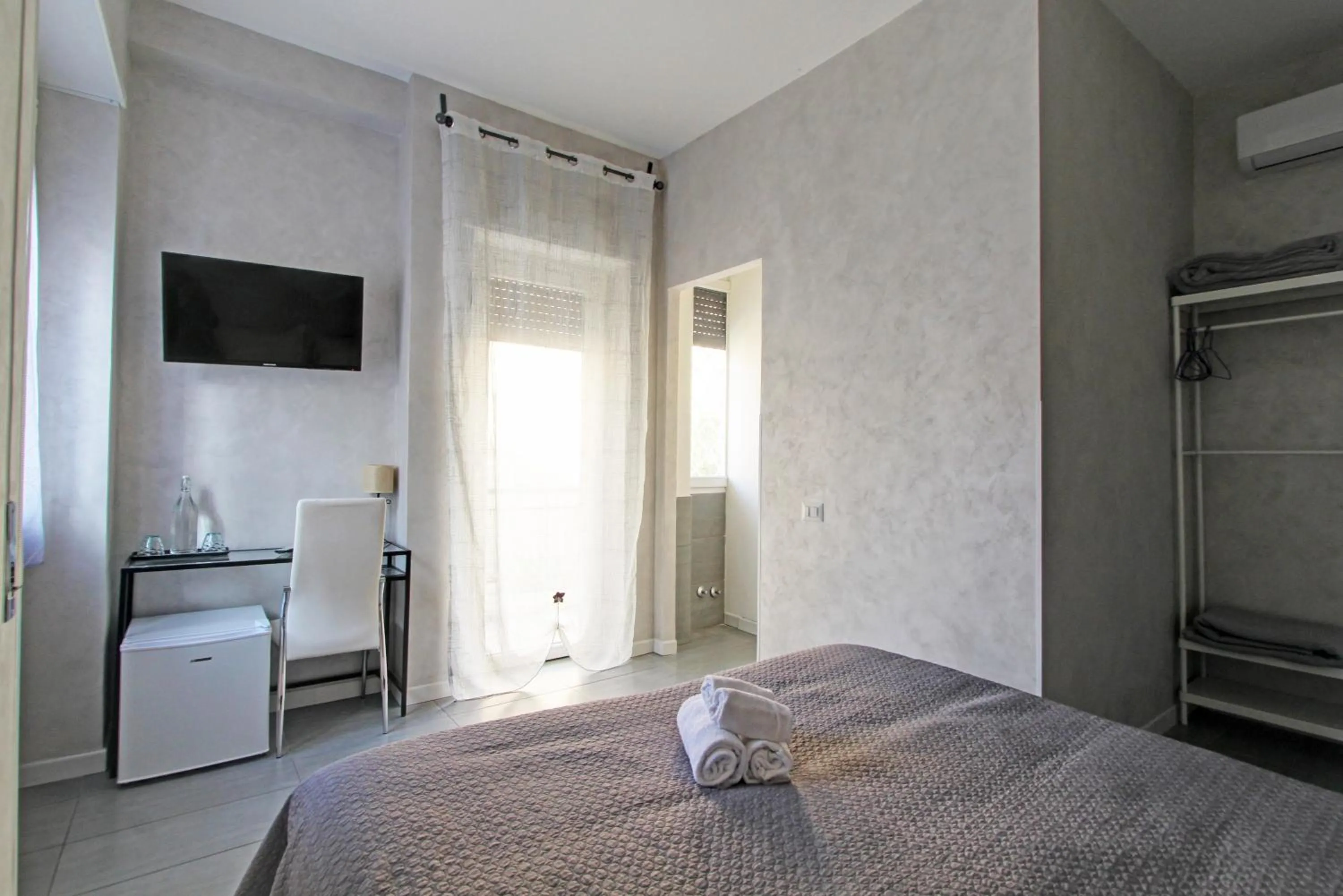 Bed in Vatican Central Suites