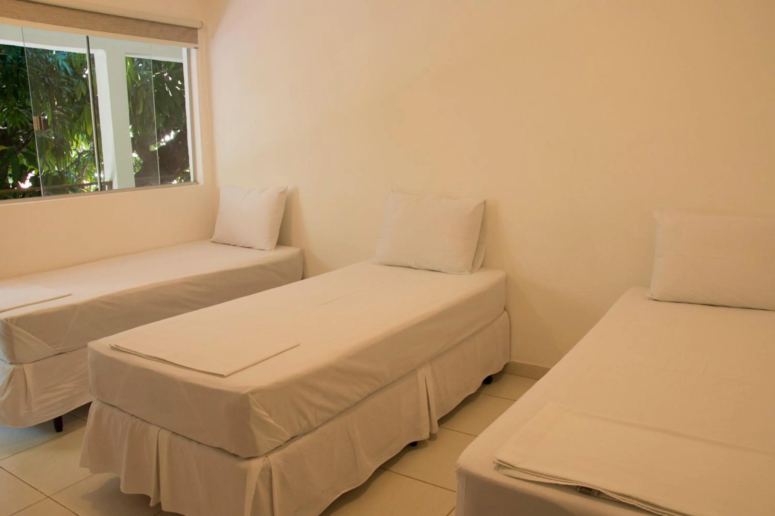 Bed in Hotel Pousada Recanto do Pai