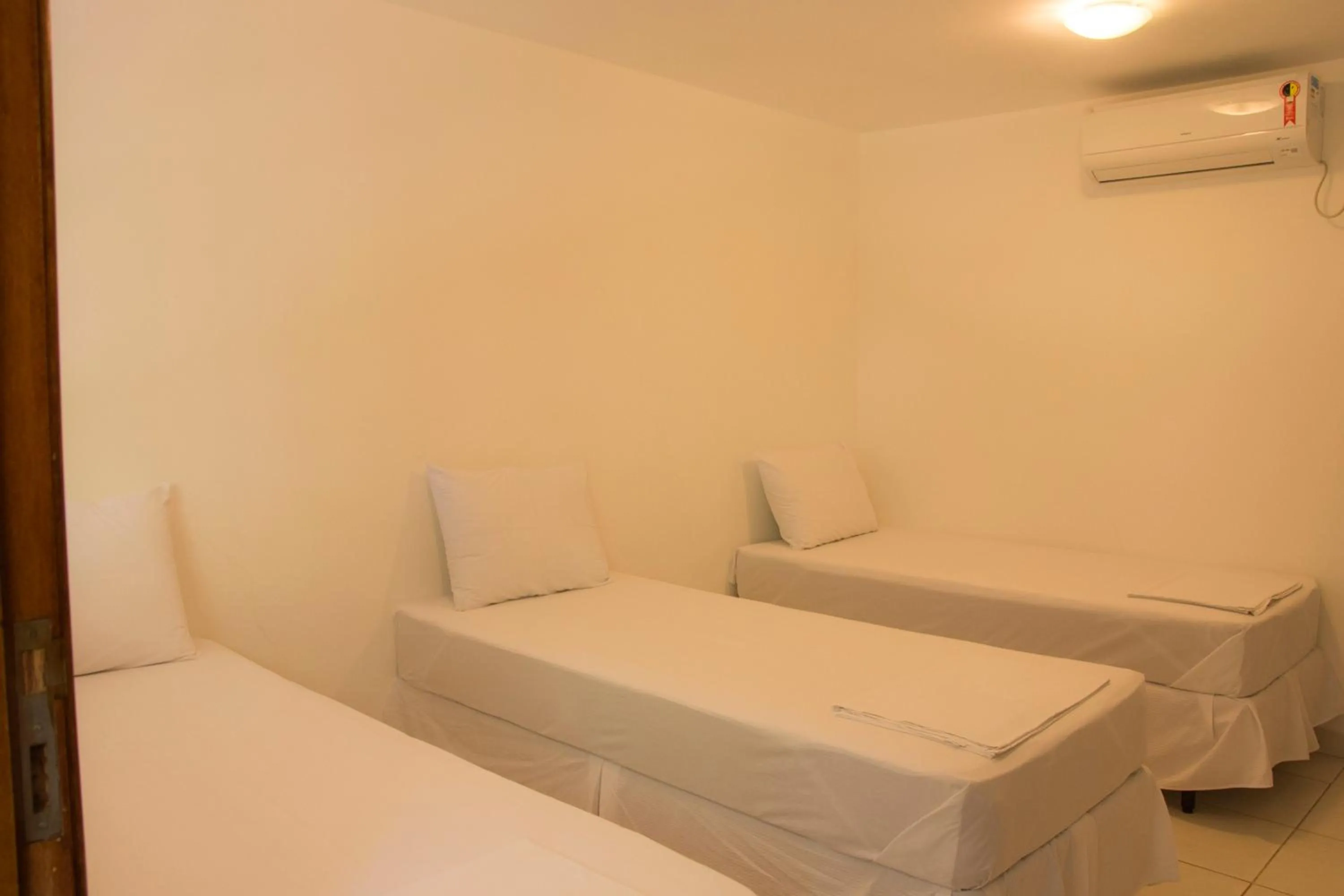 Bed in Hotel Pousada Recanto do Pai