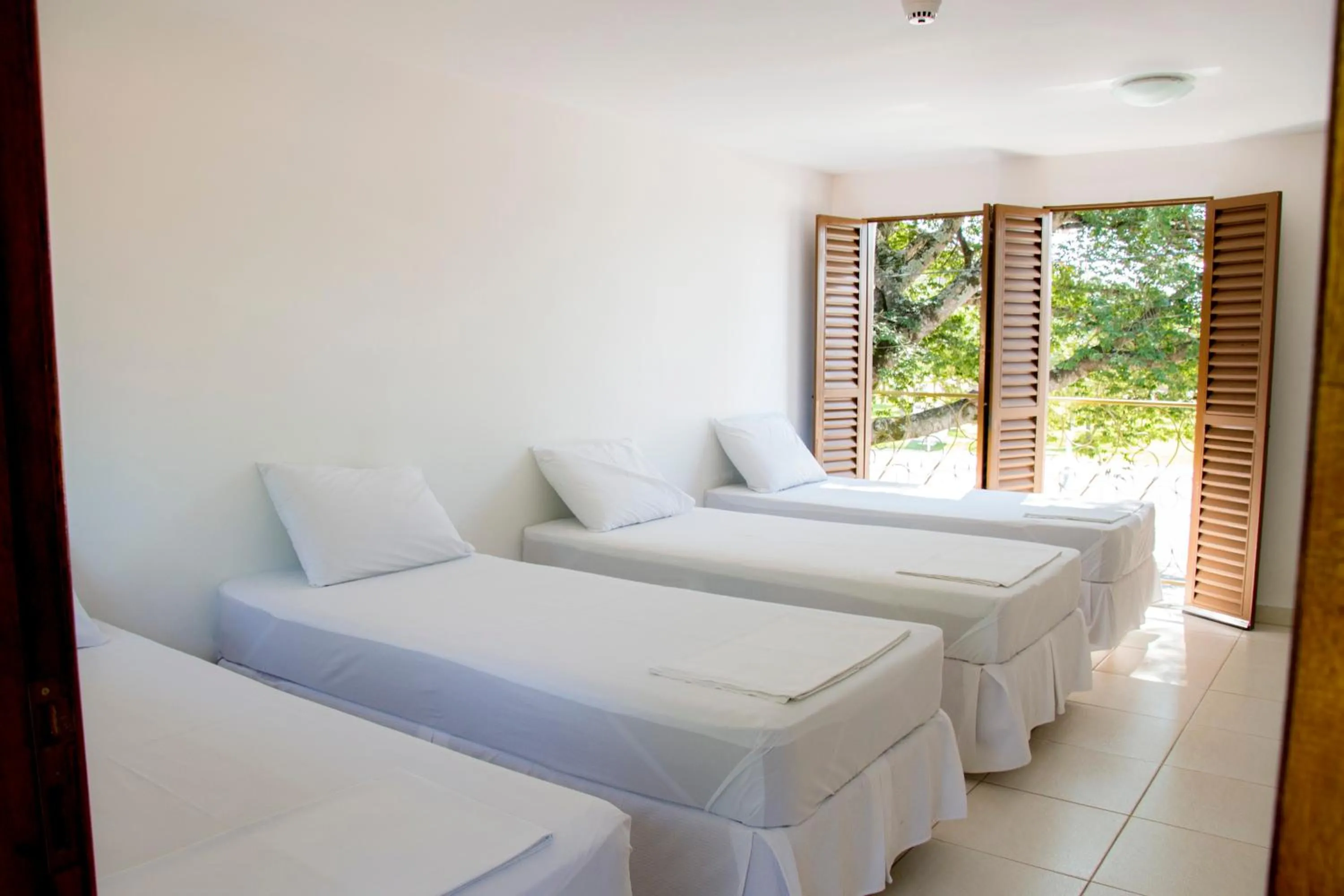 Bed in Hotel Pousada Recanto do Pai