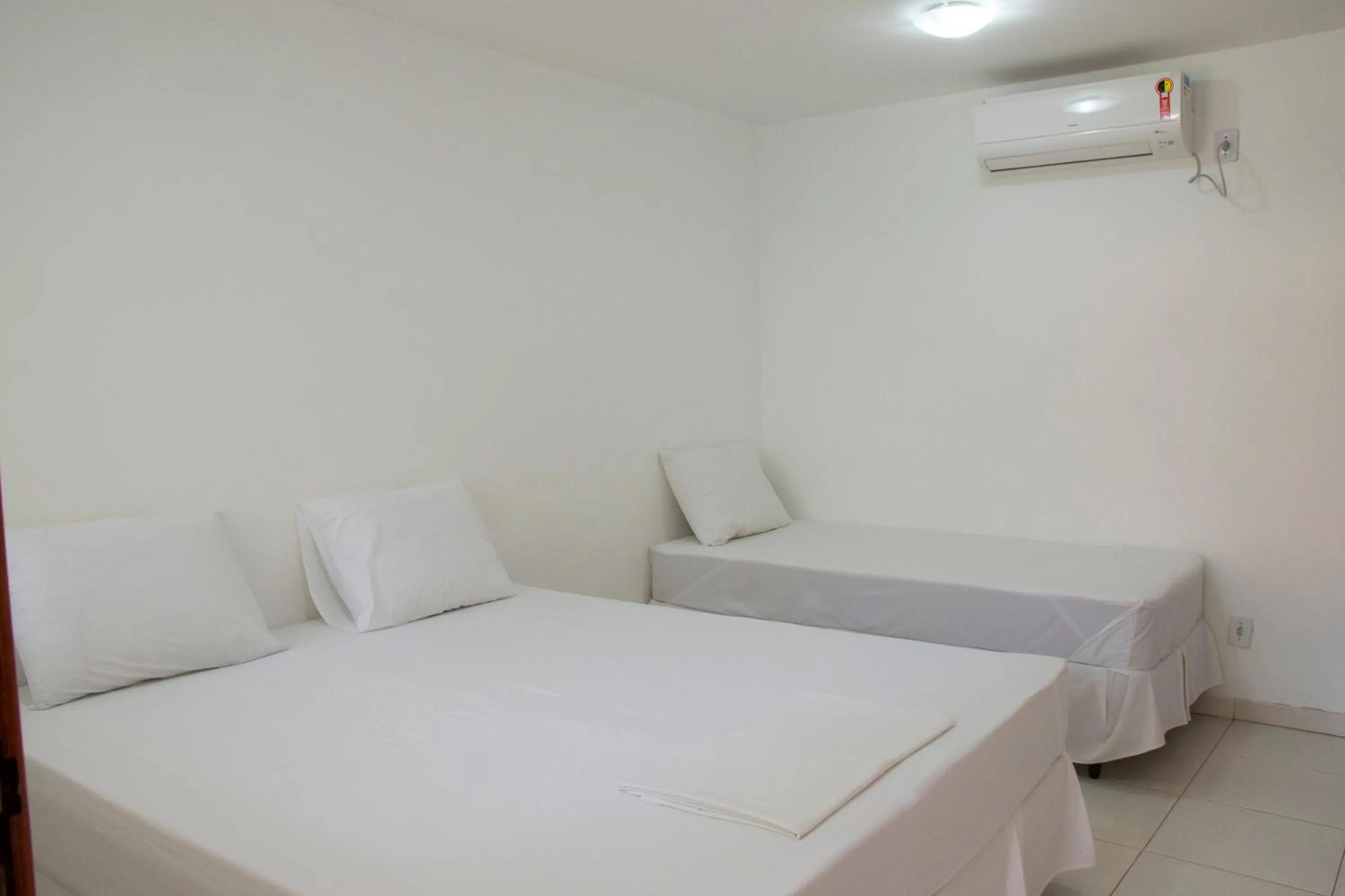 Bed in Hotel Pousada Recanto do Pai