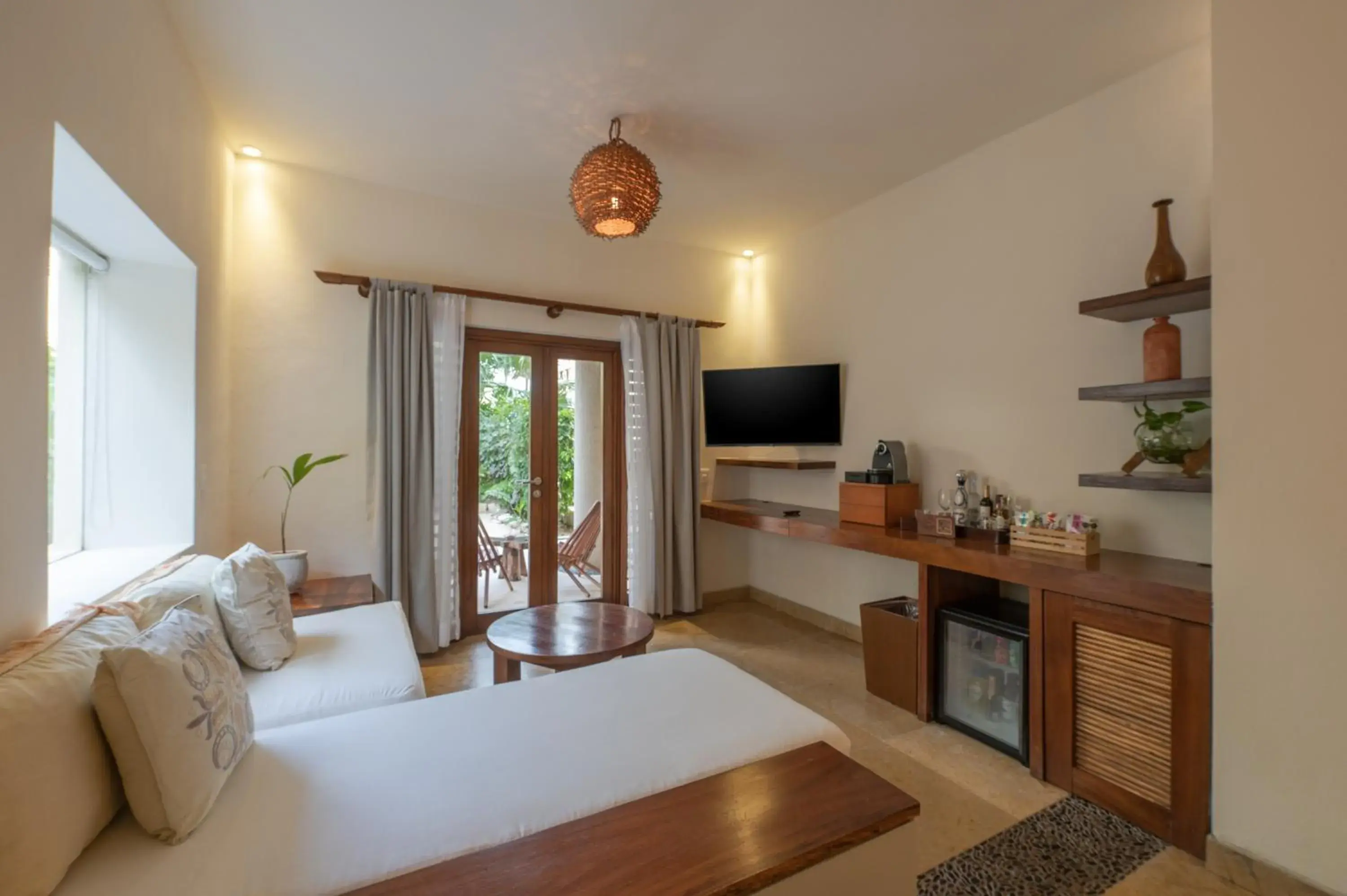 Communal lounge/ TV room, Bed in Ana y Jose Hotel & Beach Club Tulum Communal lounge/ TV room, Bed in Ana y Jose Hotel & Beach Club Tulum