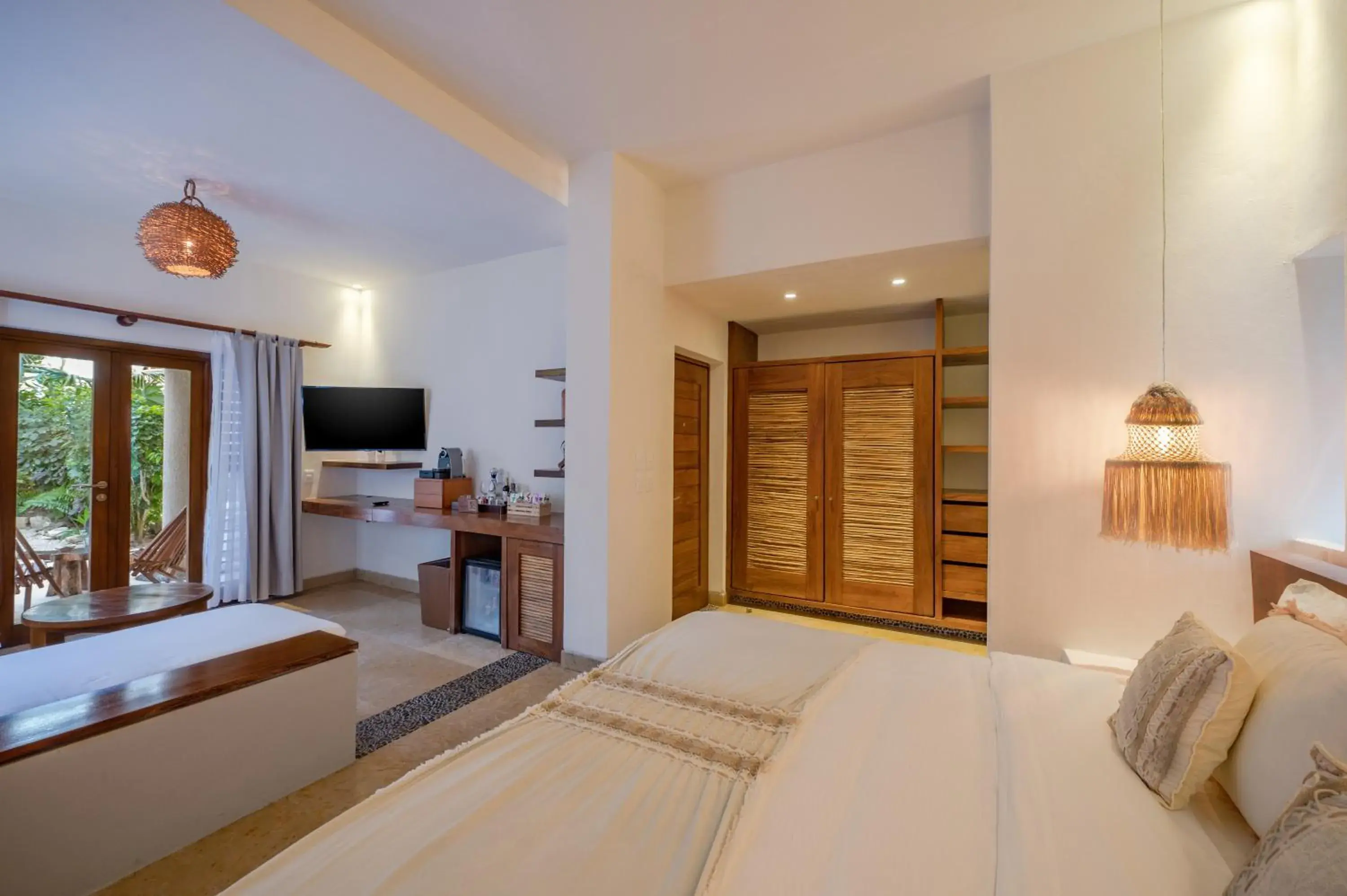 Communal lounge/ TV room, Bed in Ana y Jose Hotel & Beach Club Tulum Communal lounge/ TV room, Bed in Ana y Jose Hotel & Beach Club Tulum