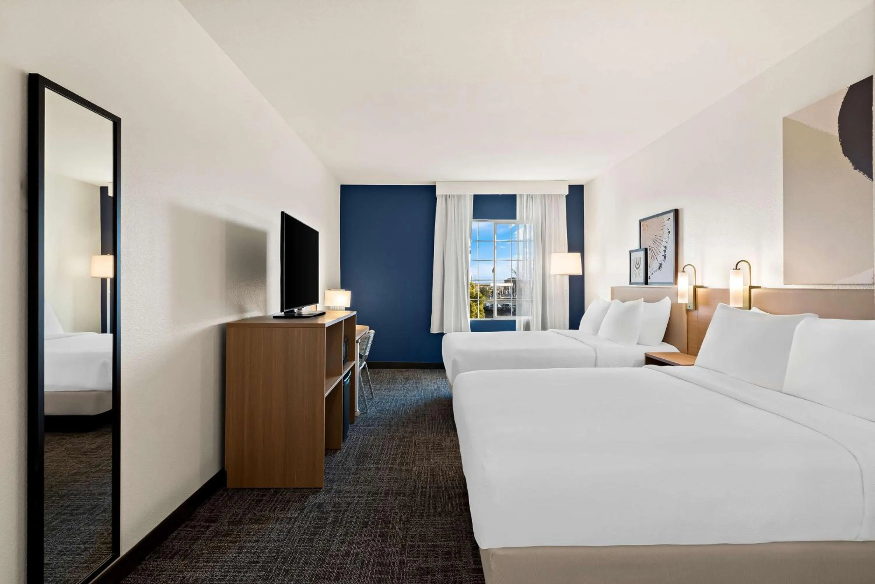 Photo of the whole room, Bed in Spark by Hilton Newest Hotel in Williams CA