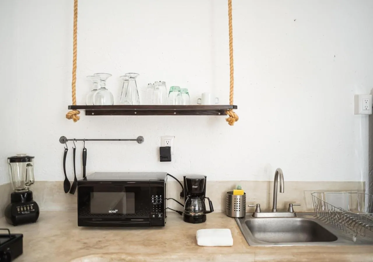 Kitchen or kitchenette in Villa Los Mangles Boutique Hotel