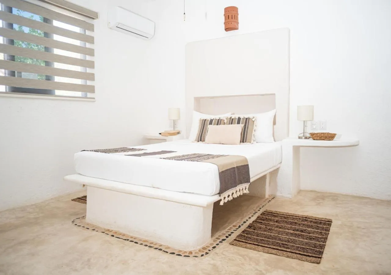 Bed in Villa Los Mangles Boutique Hotel