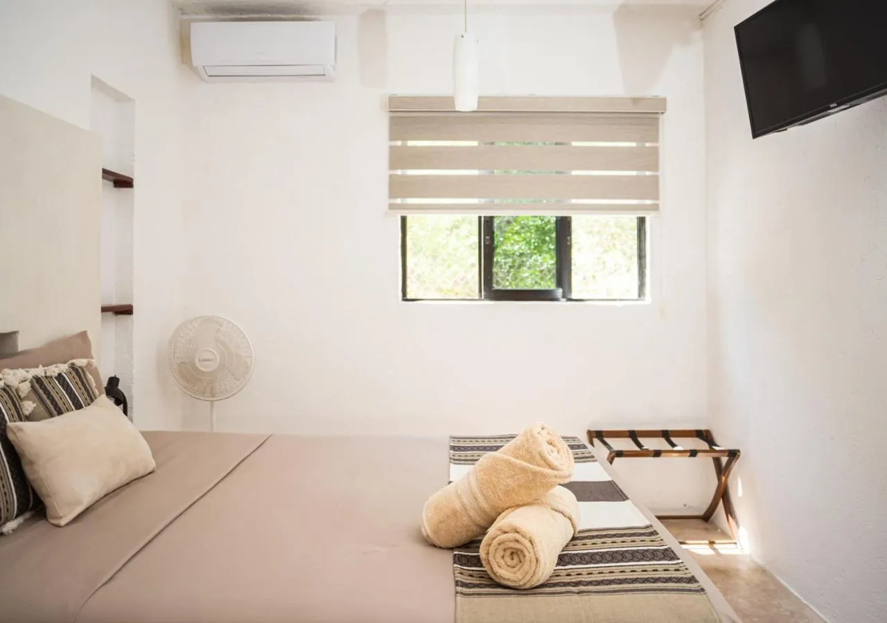 Bed in Villa Los Mangles Boutique Hotel