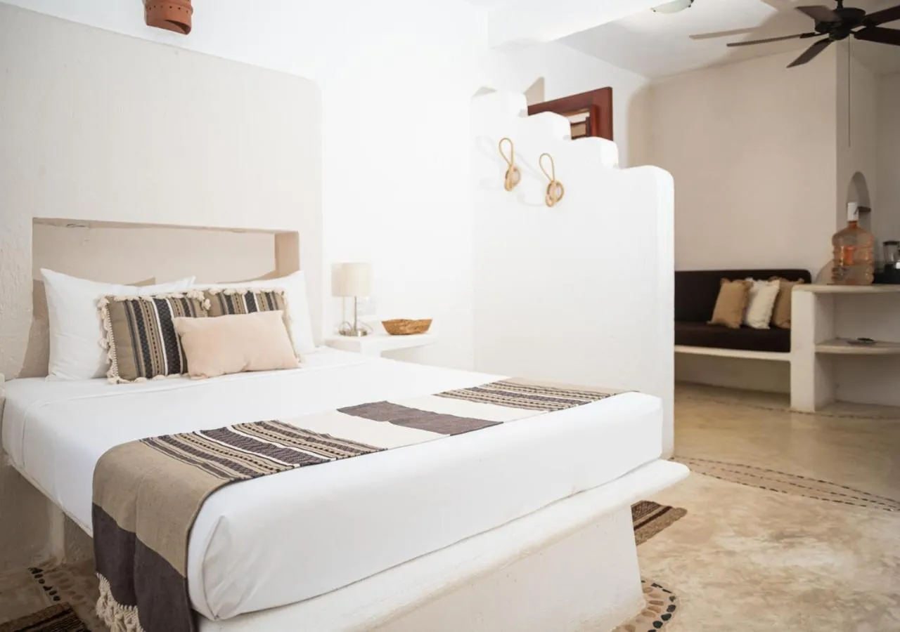 Bed in Villa Los Mangles Boutique Hotel