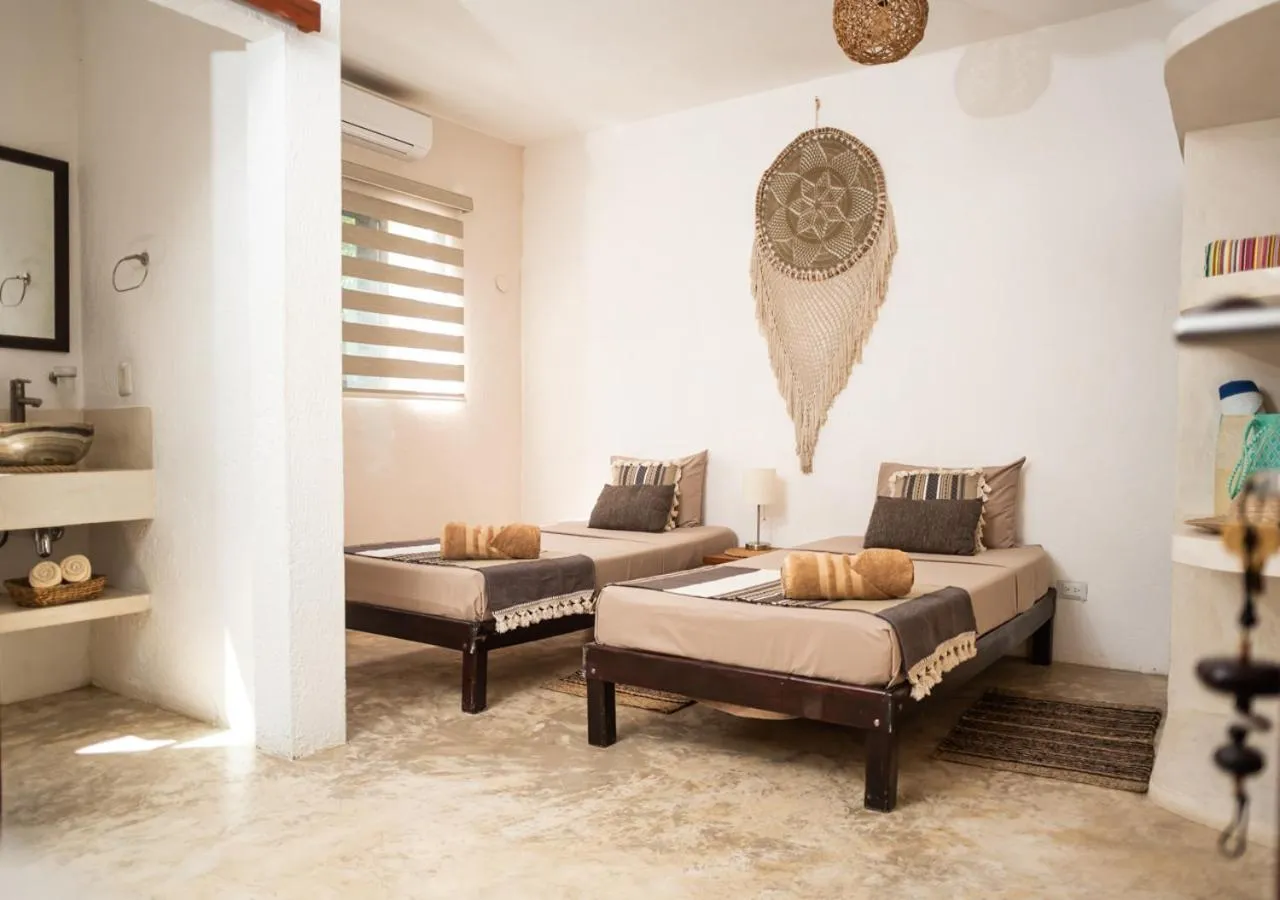 Bed in Villa Los Mangles Boutique Hotel