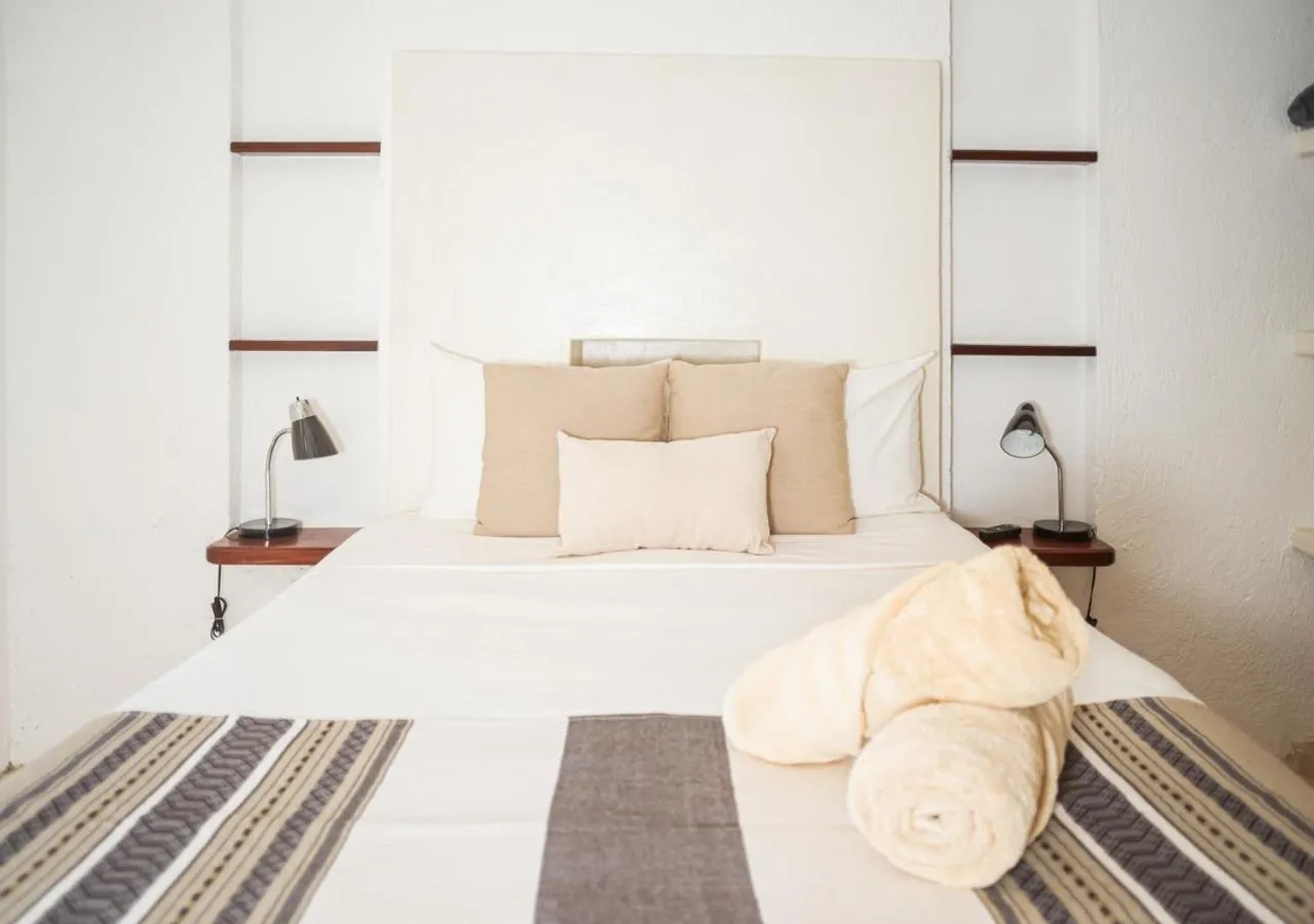 Bed in Villa Los Mangles Boutique Hotel