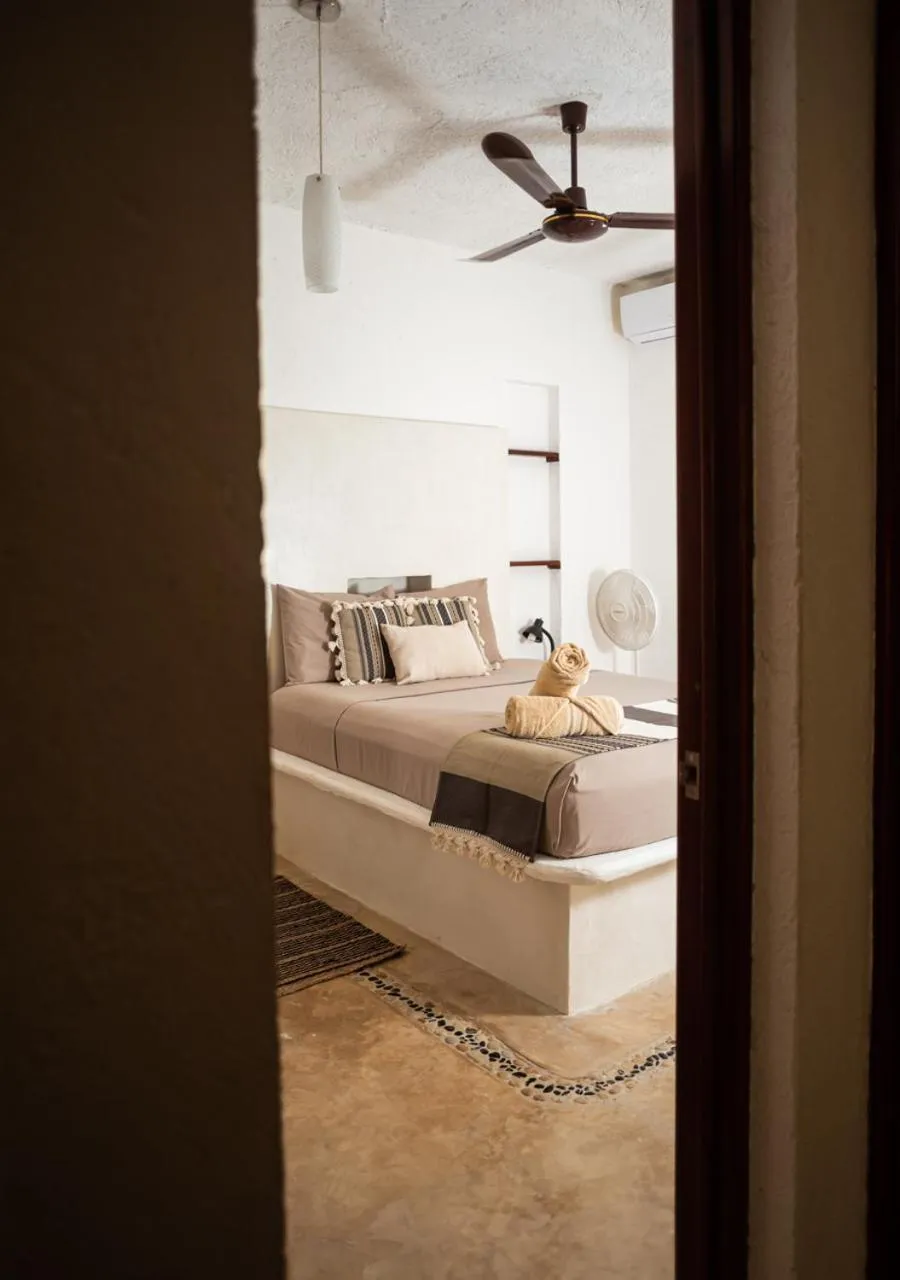 Bed in Villa Los Mangles Boutique Hotel