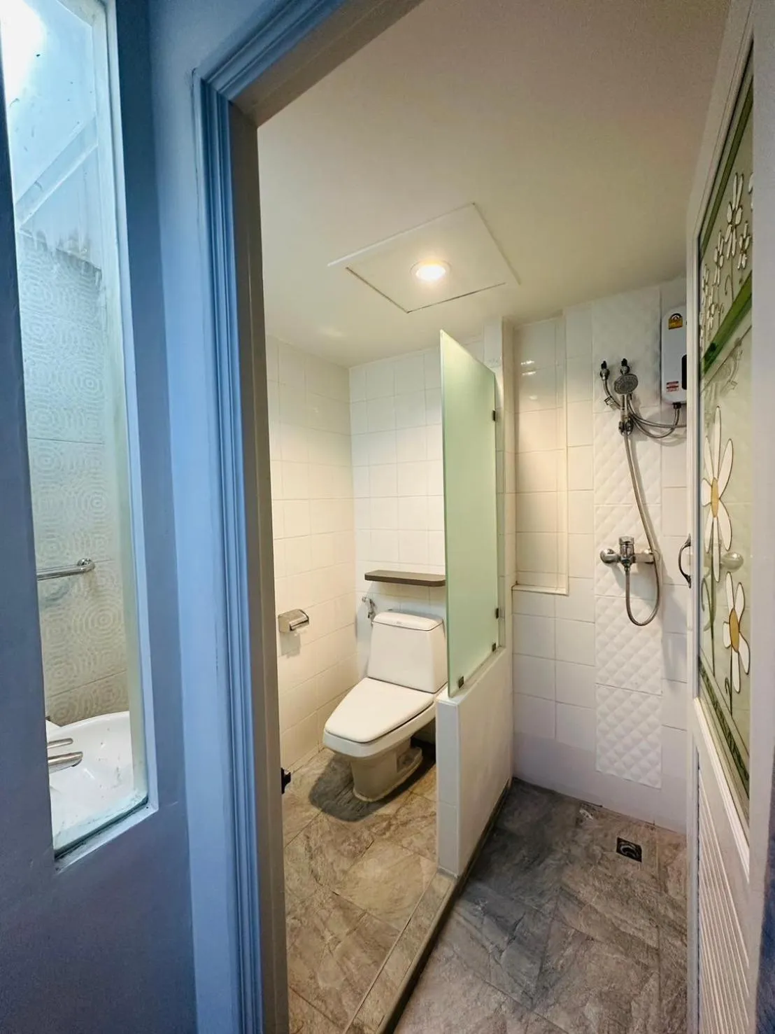 Bathroom in Royal Garden Home Hotel