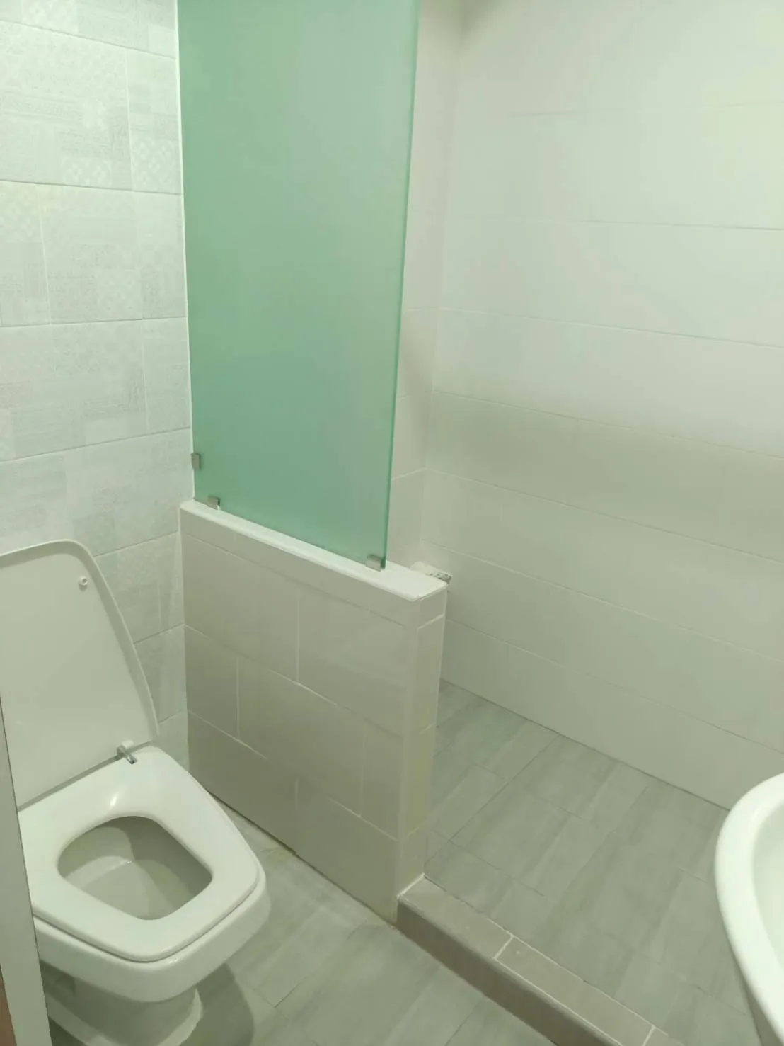 Bathroom in Royal Garden Home Hotel