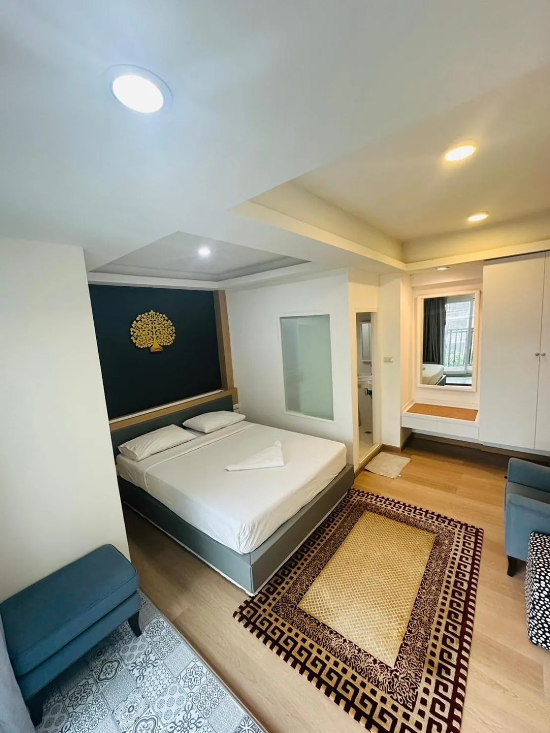 Bed in Royal Garden Home Hotel