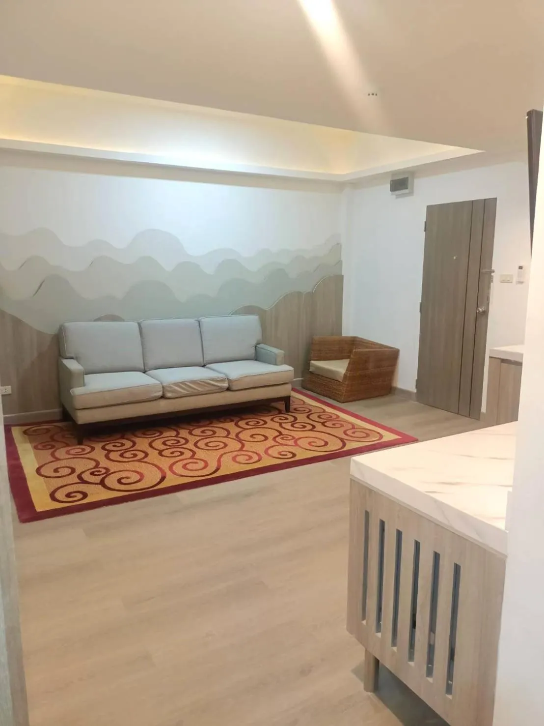 Living room in Royal Garden Home Hotel