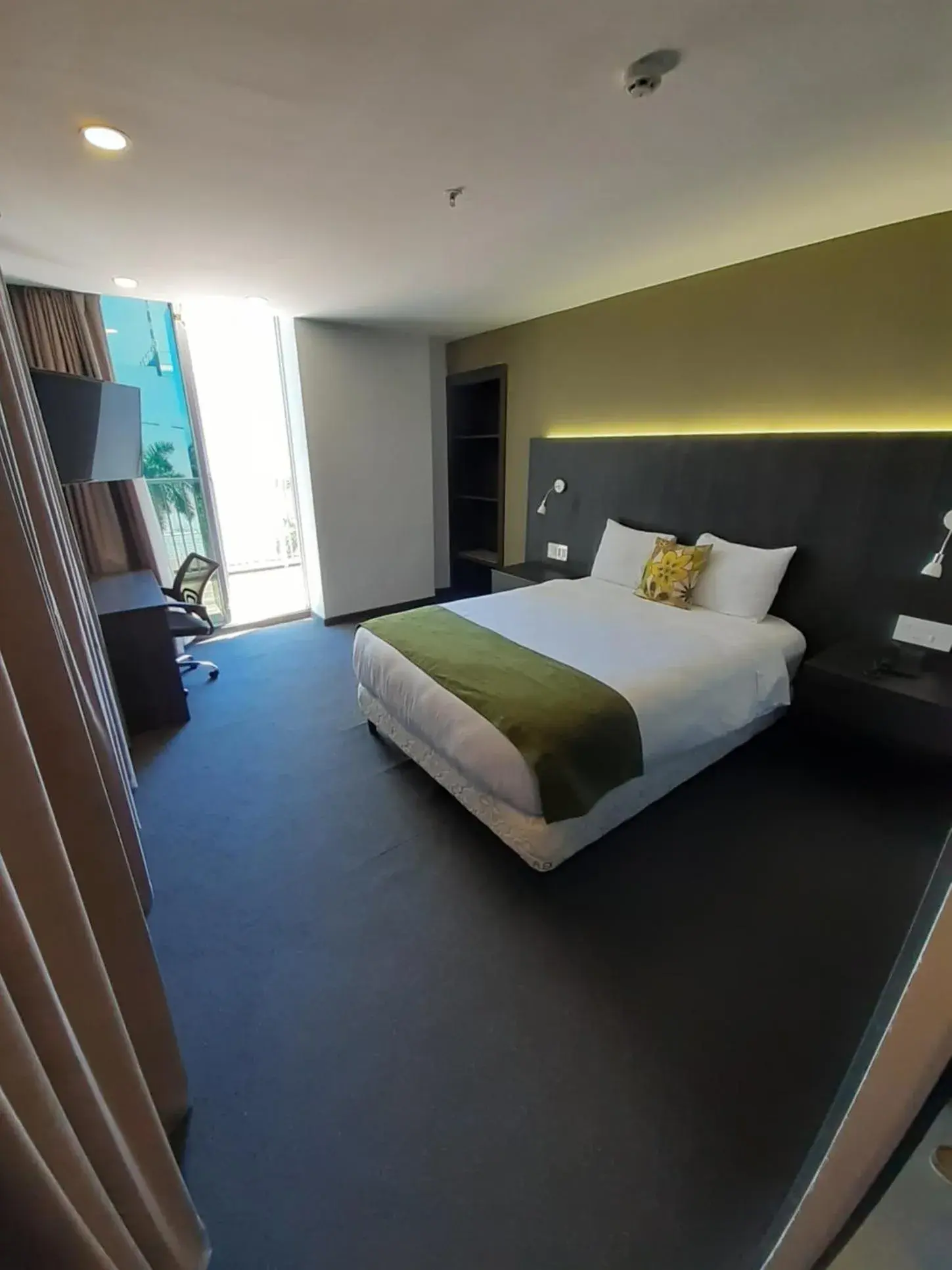 Bed in Innfiniti Hotel & Suites Bed in Innfiniti Hotel & Suites