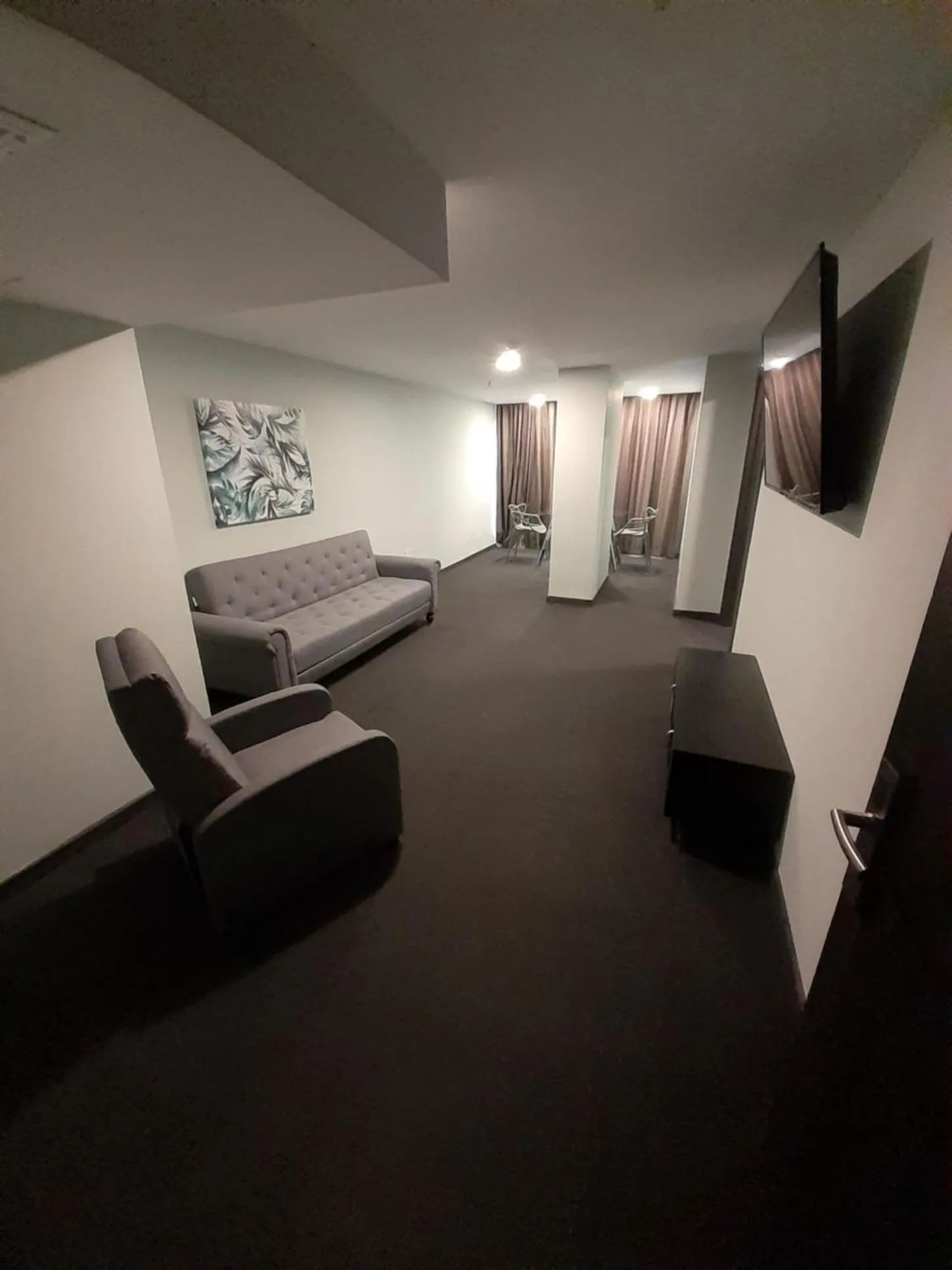 Bed in Innfiniti Hotel & Suites