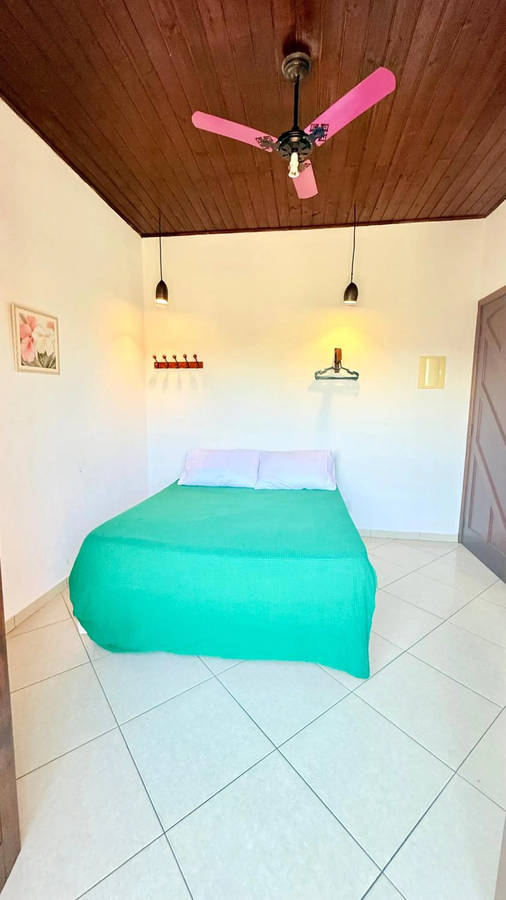 Bed in Pousada Cores Do Mar