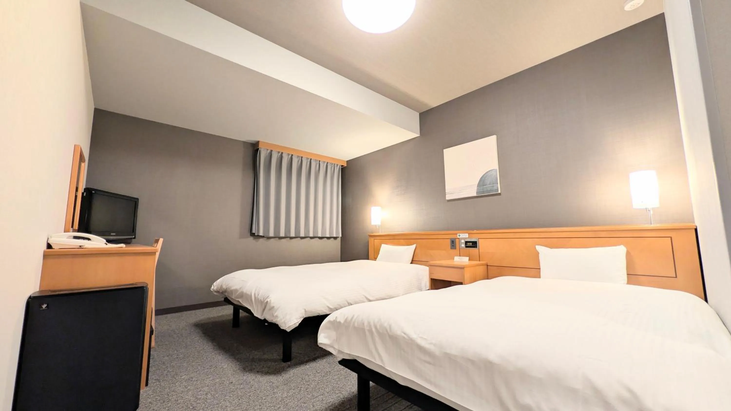 Photo of the whole room, Bed in Hotel Route-Inn Aomori Ekimae