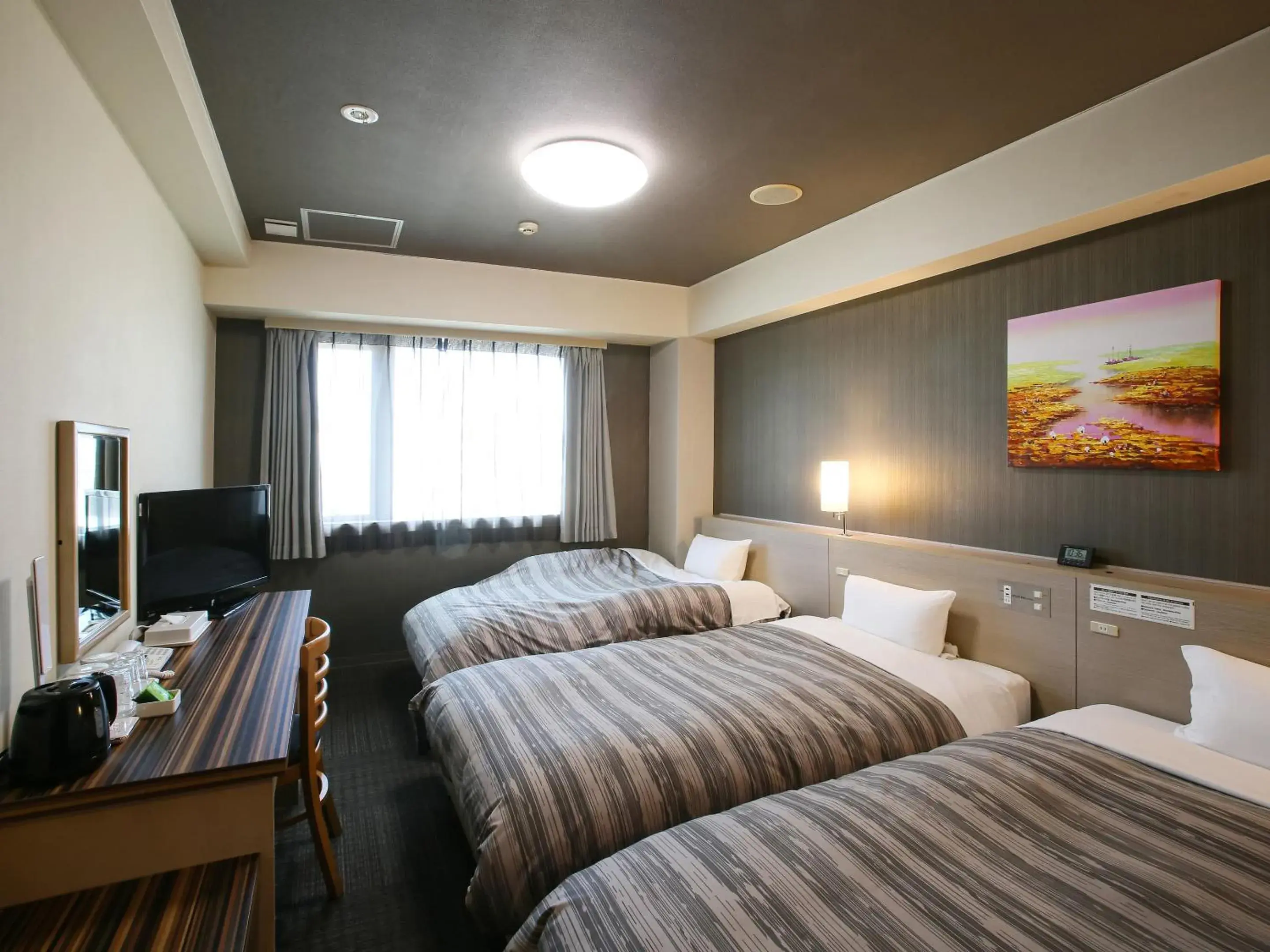 Bedroom, Bed in Route Inn Grantia Ishigaki Bedroom, Bed in Route Inn Grantia Ishigaki