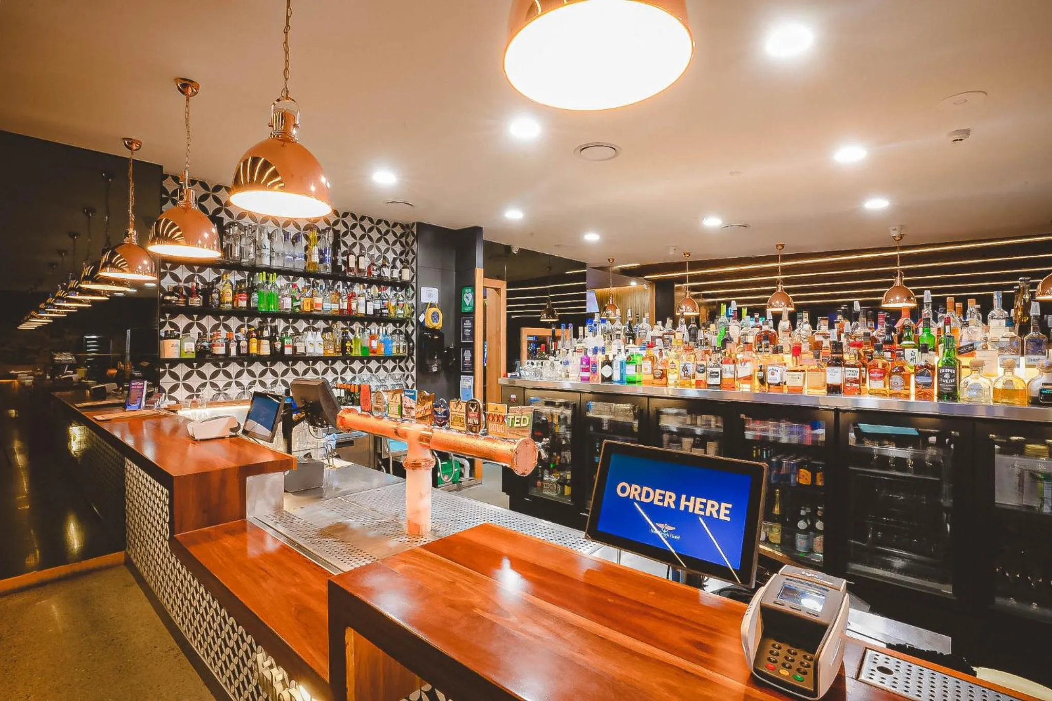 Lounge or bar in Airlie Beach Hotel