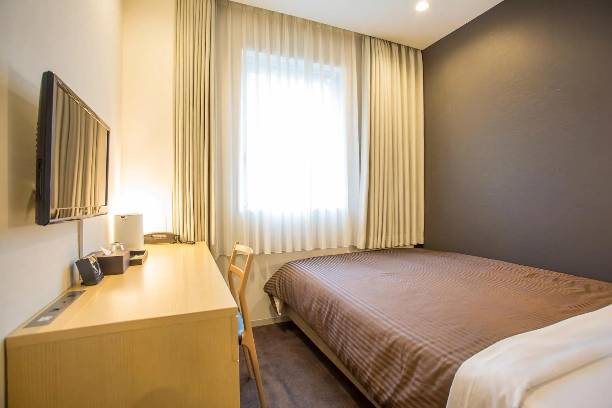 Bed in Hotel Asia Center of Japan