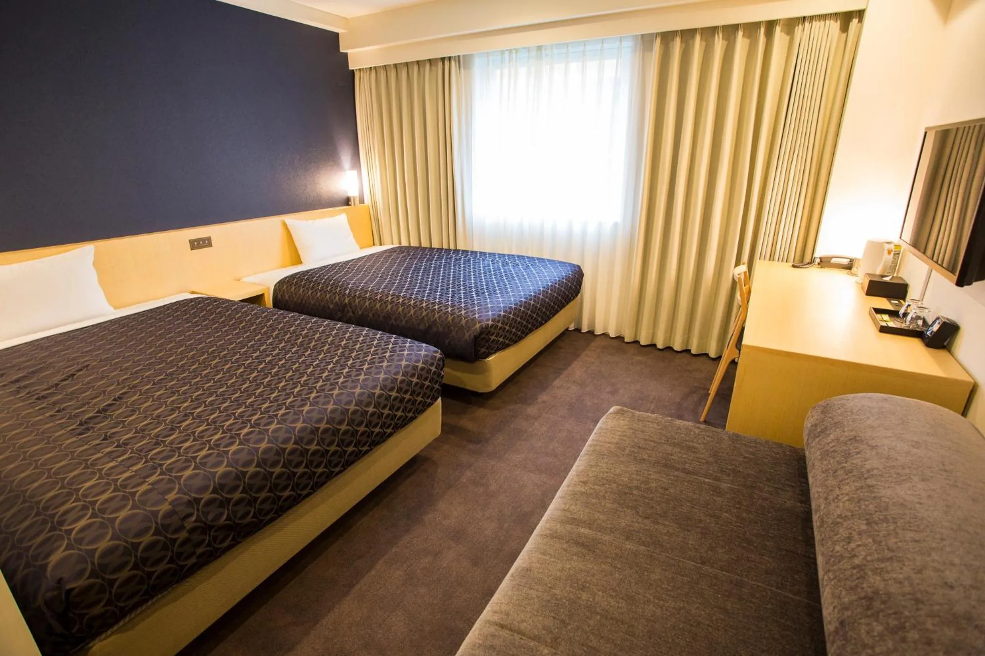 Bed in Hotel Asia Center of Japan