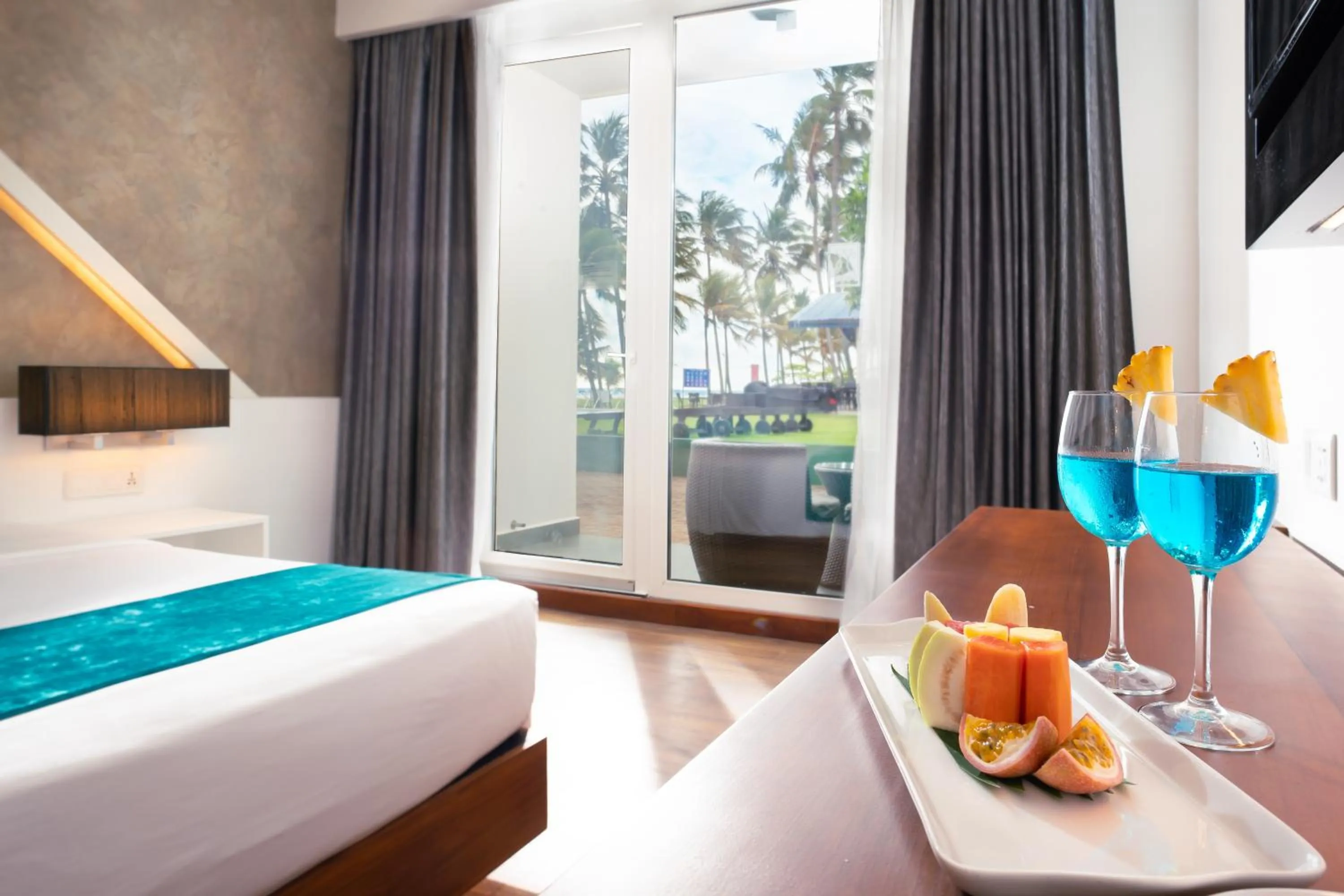 Bed in Camelot Beach Hotel