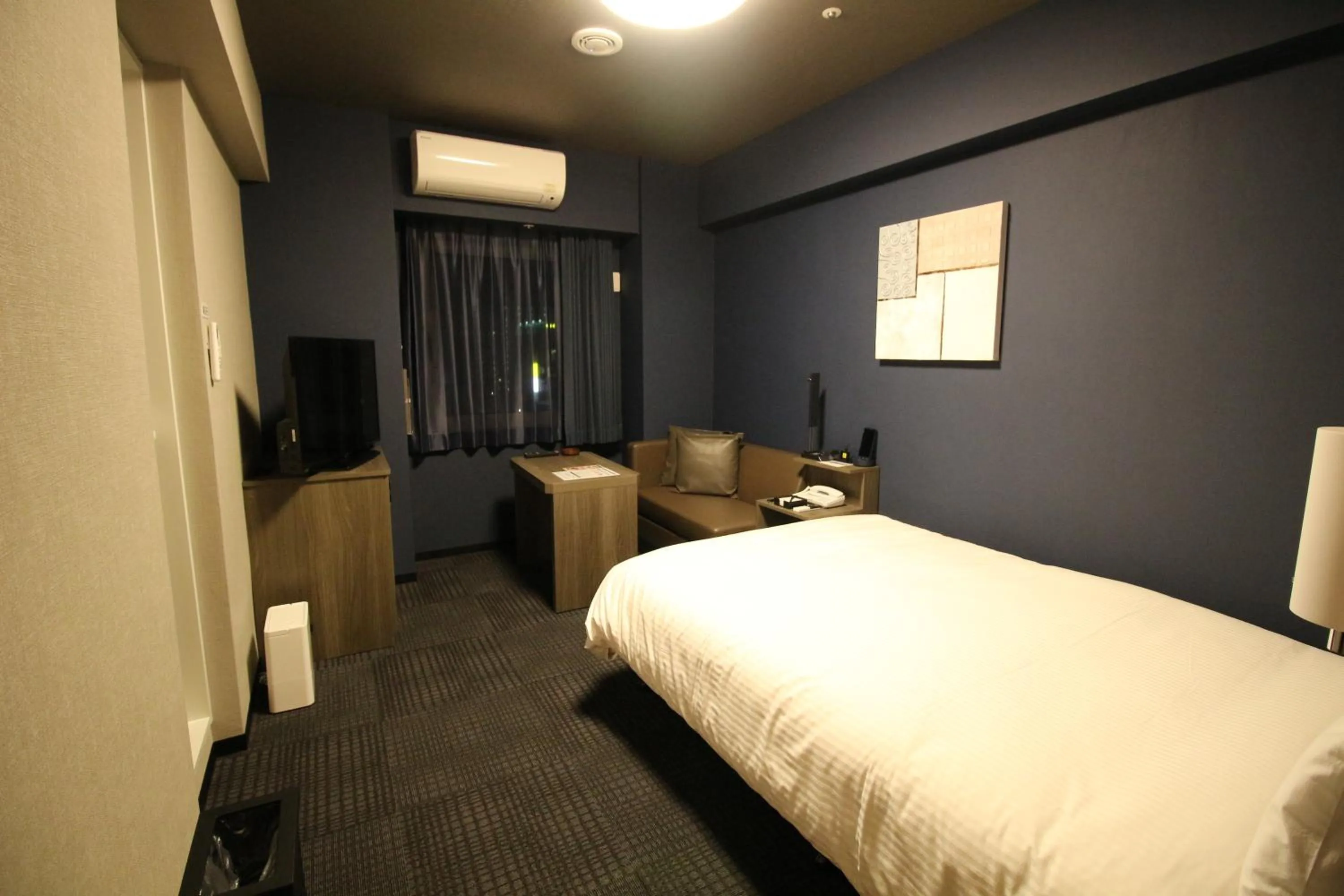 Bed in Hotel Route-Inn Grand Tokyo Toyocho
