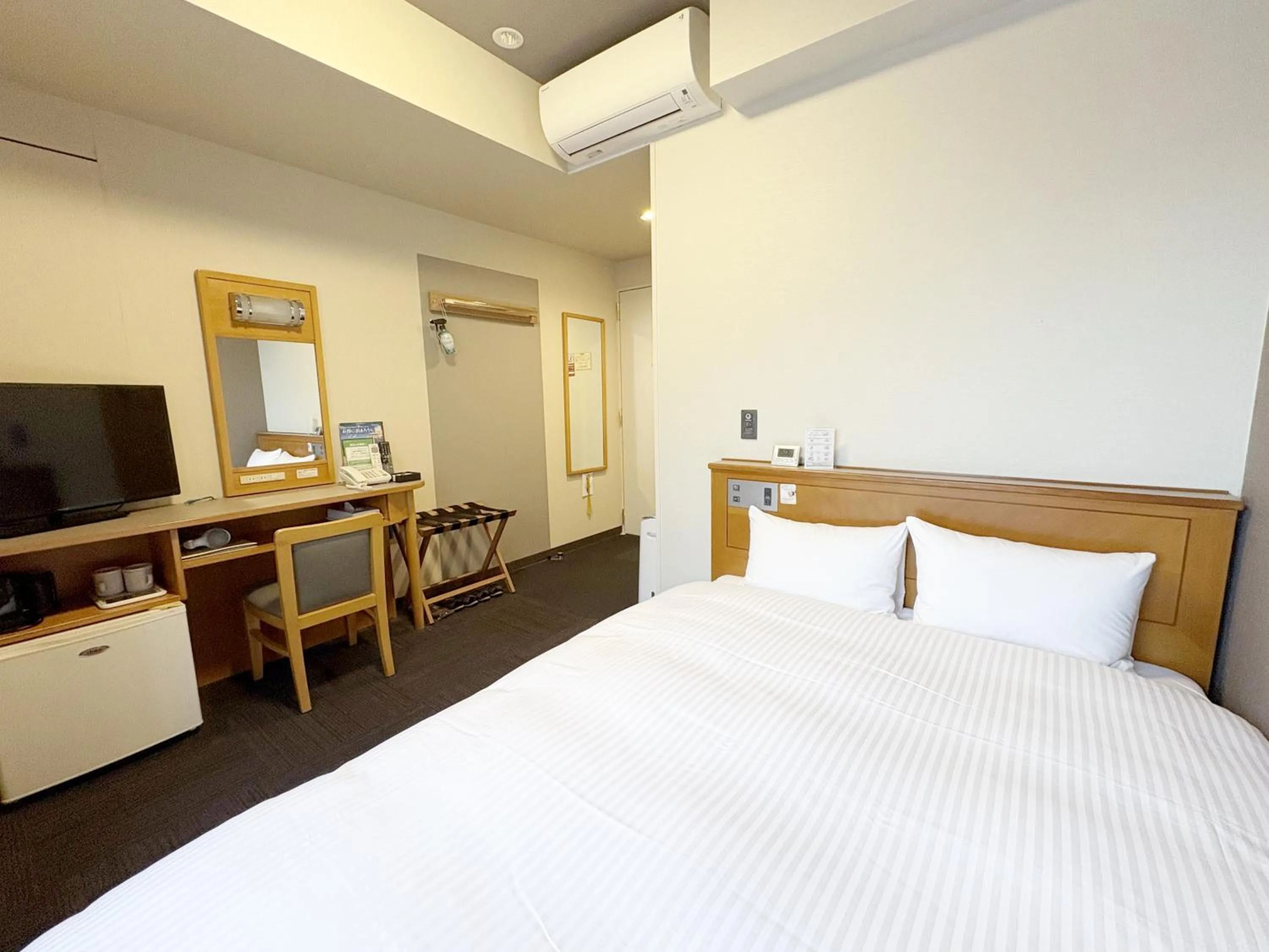 Photo of the whole room, Bed in Hotel Route-Inn Nago