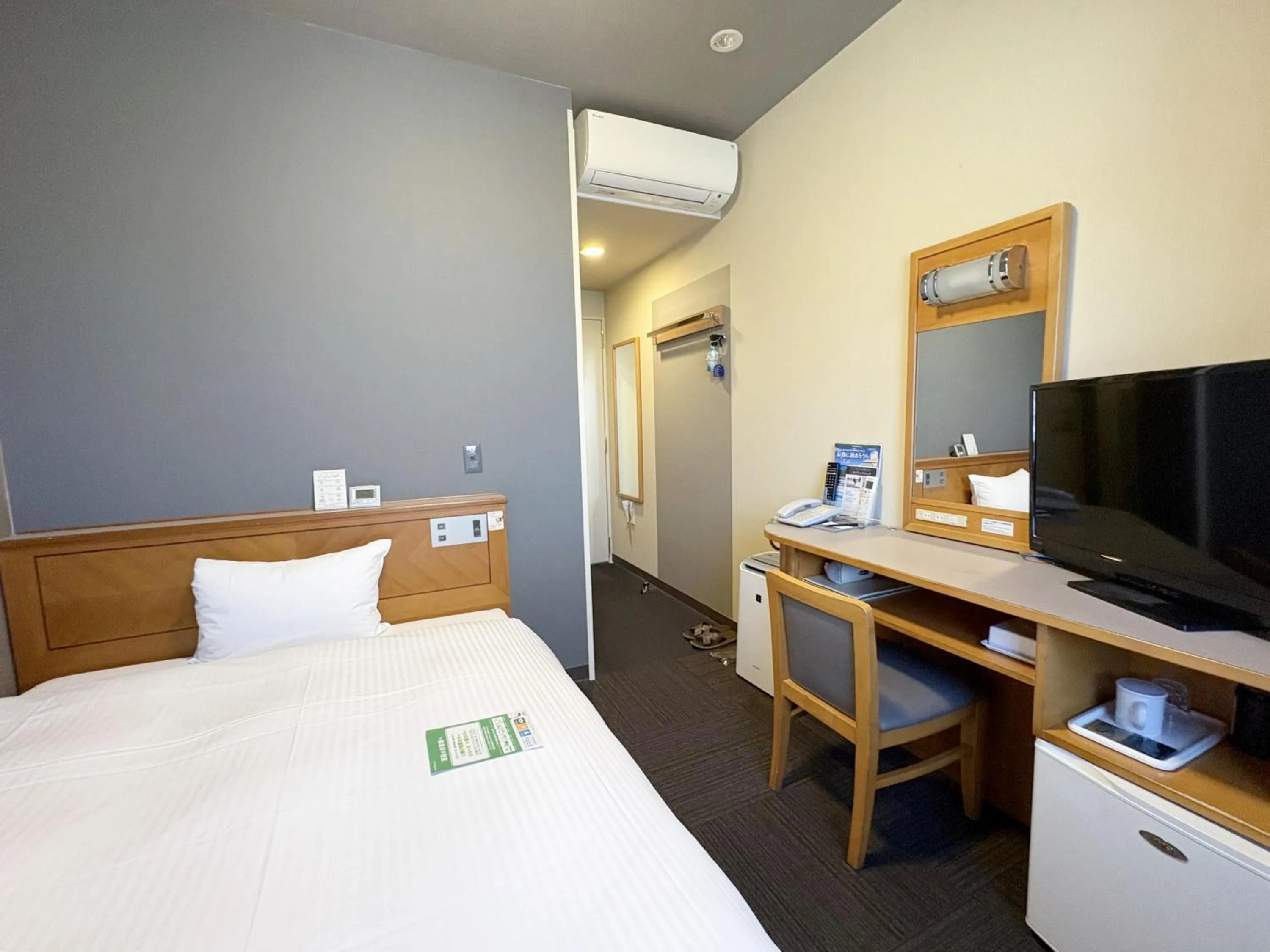 Photo of the whole room, Bed in Hotel Route-Inn Nago