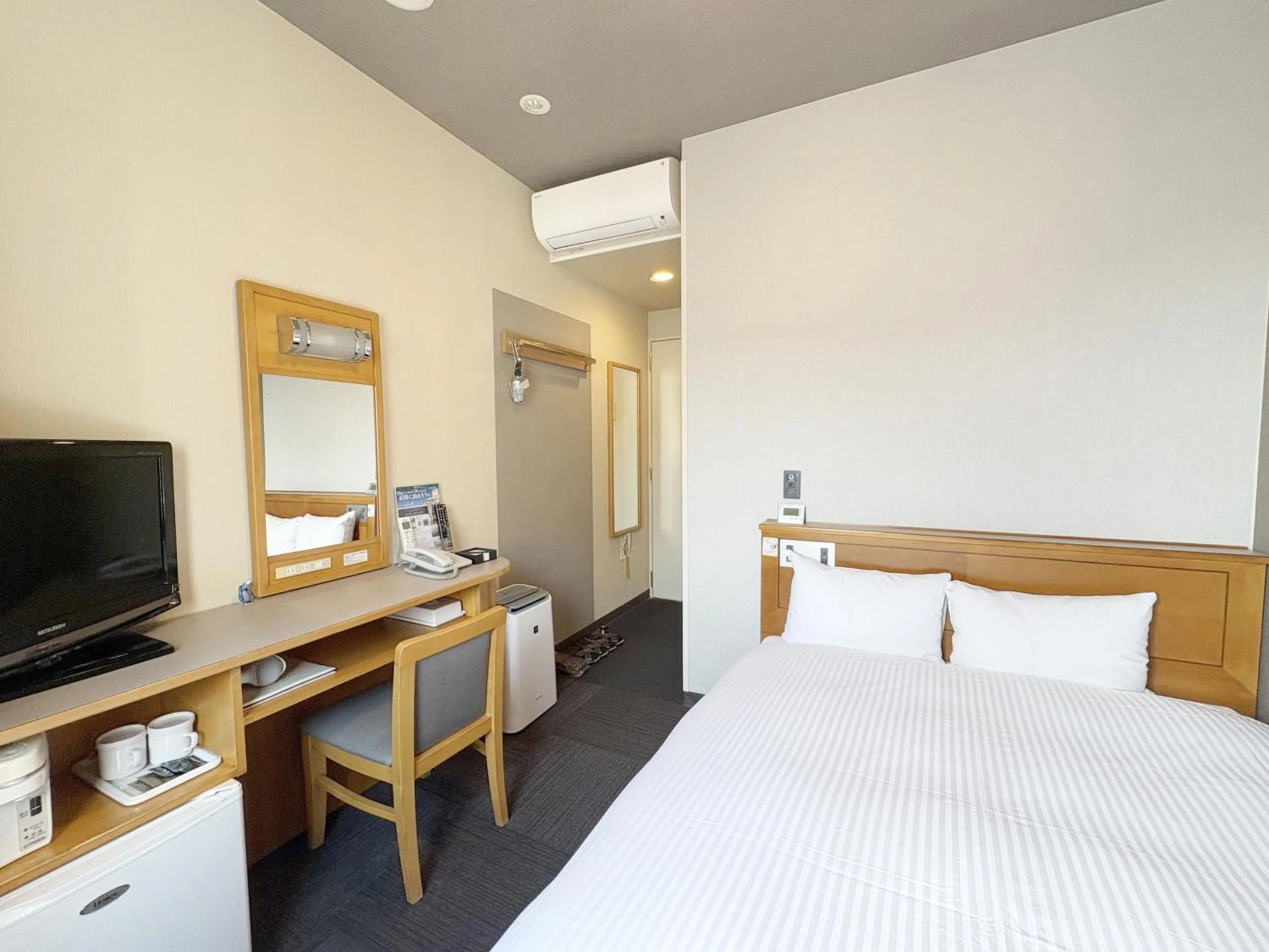Photo of the whole room, Bed in Hotel Route-Inn Nago
