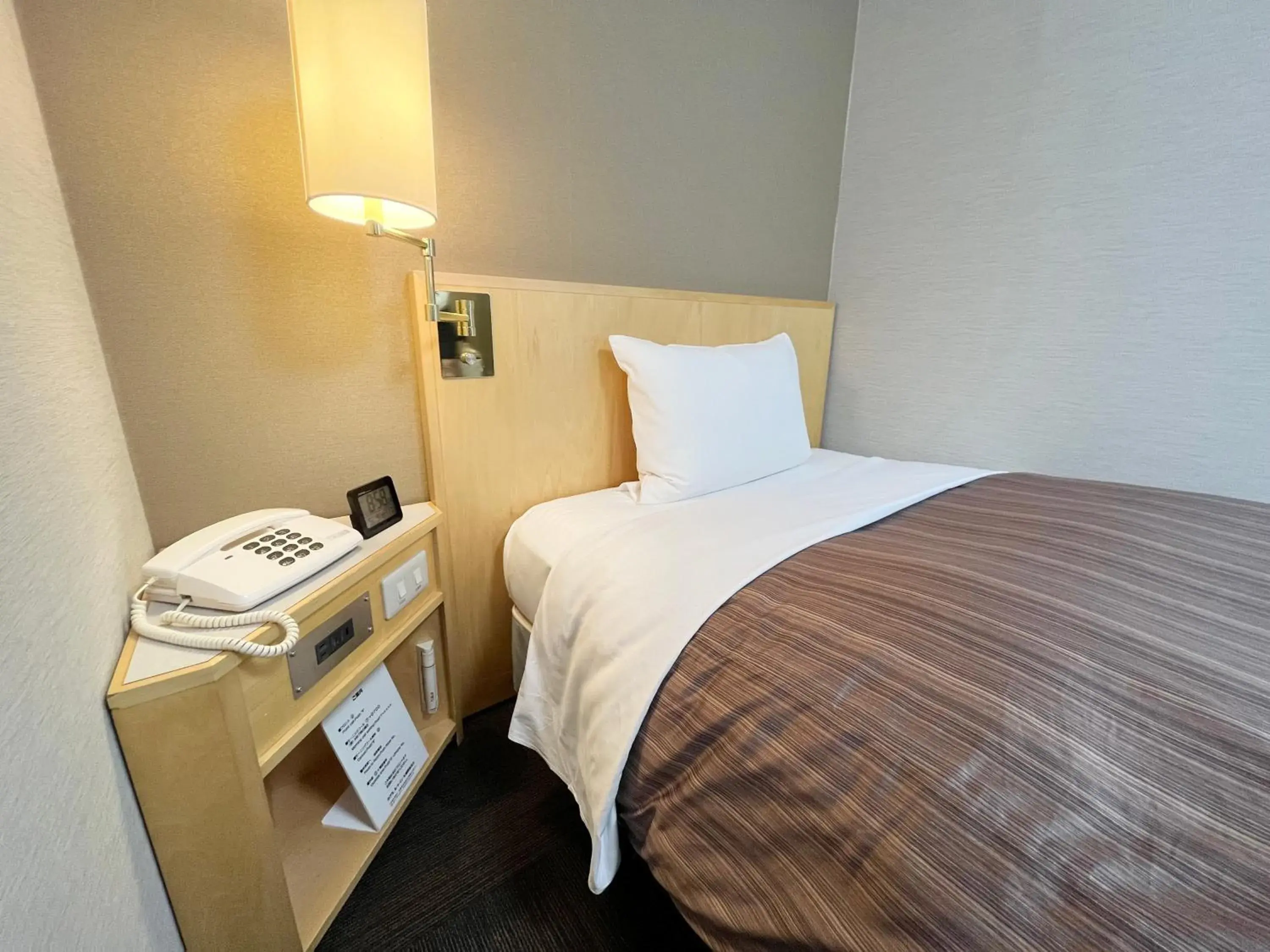 Photo of the whole room, Bed in Hotel Route-Inn Sapporo Ekimae Kitaguchi Photo of the whole room, Bed in Hotel Route-Inn Sapporo Ekimae Kitaguchi