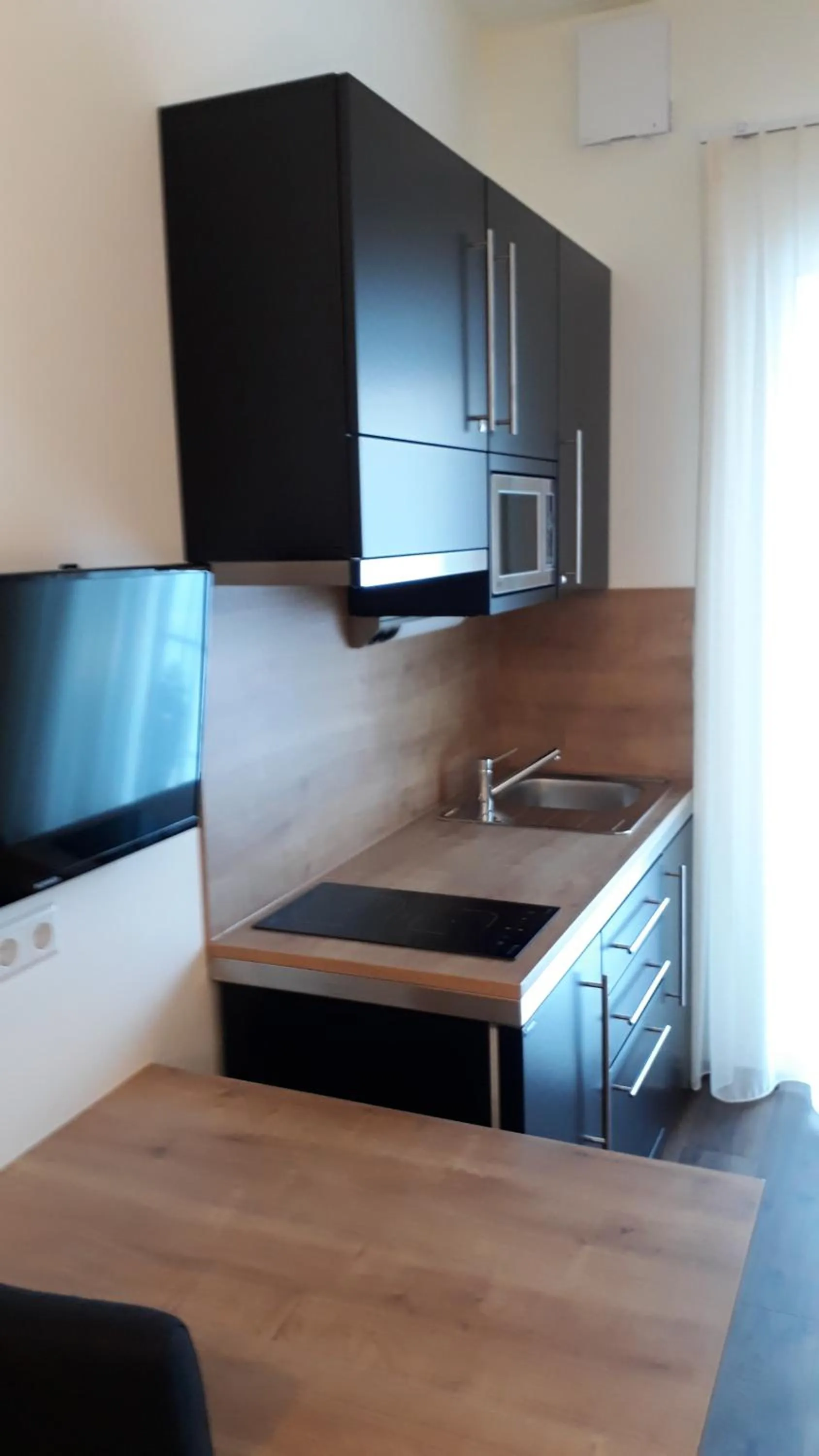 Kitchen or kitchenette in Waldhotel Rainau