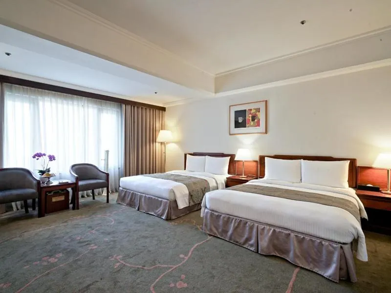 Bed in The Howard Prince Hotel Taichung