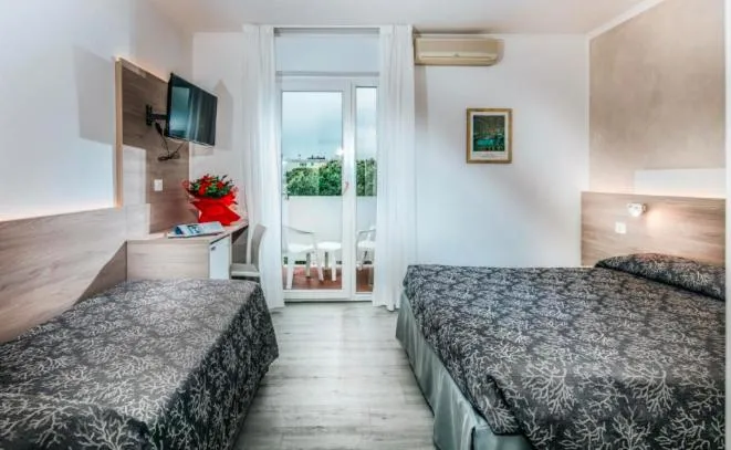 Bed in Hotel Ambassador Meuble