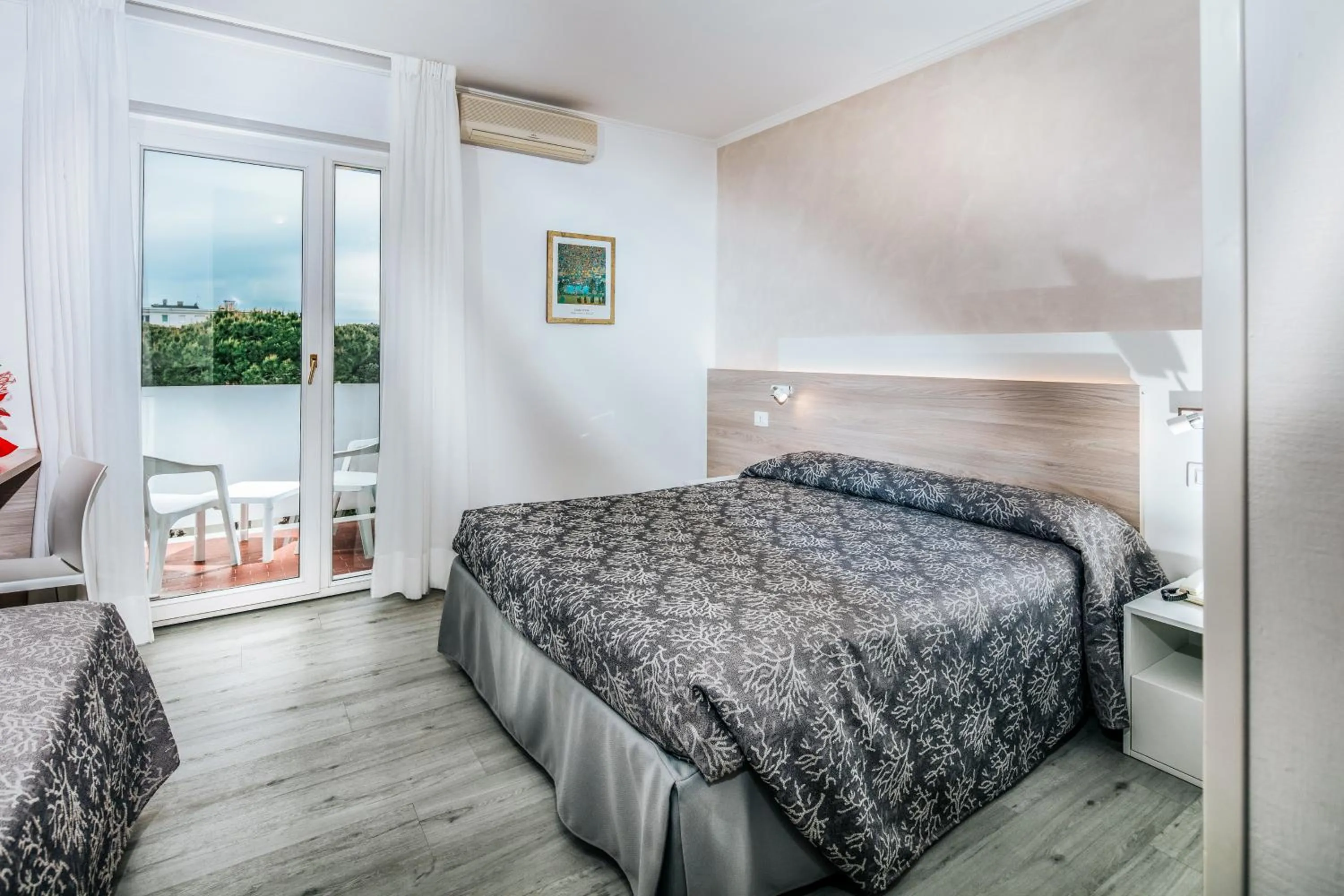 Bed in Hotel Ambassador Meuble