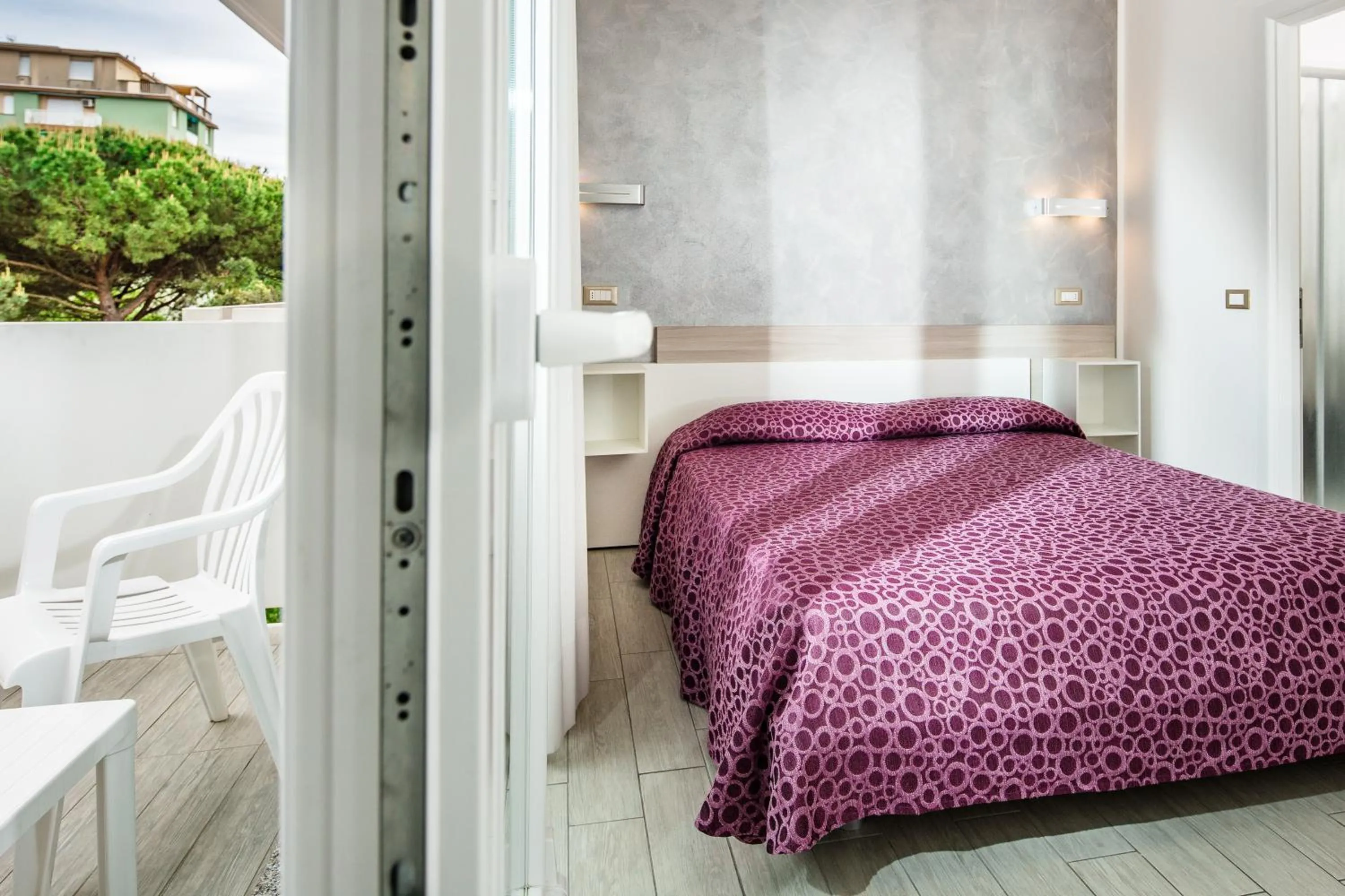 Bed in Hotel Ambassador Meuble