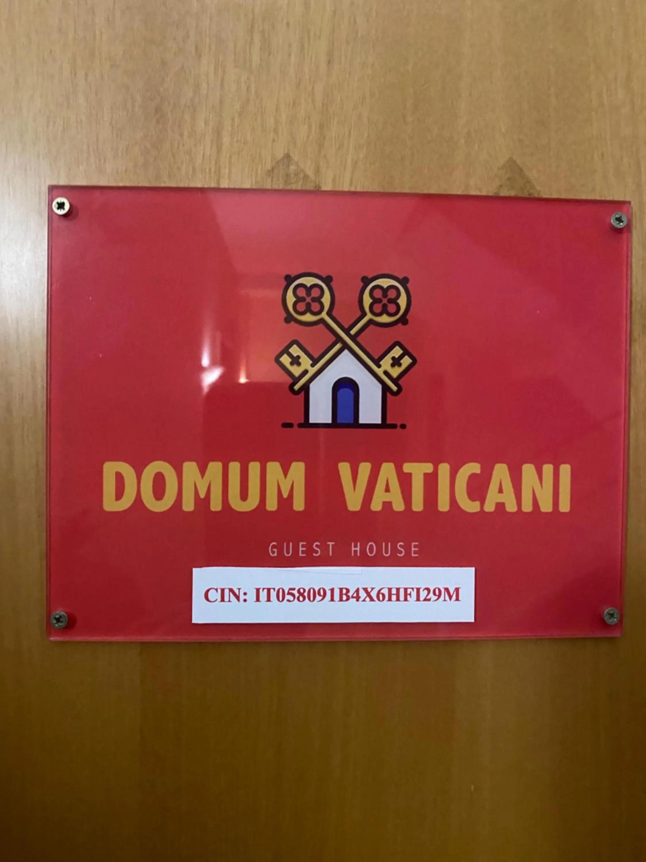 Property logo or sign in Domum Vaticani