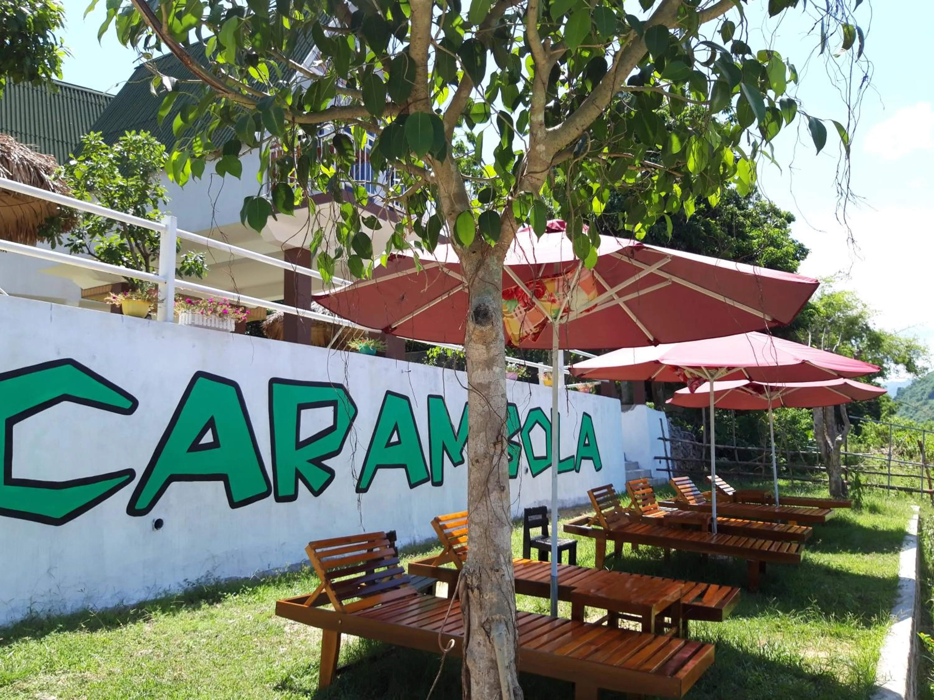 Property logo or sign in Carambola Bungalow