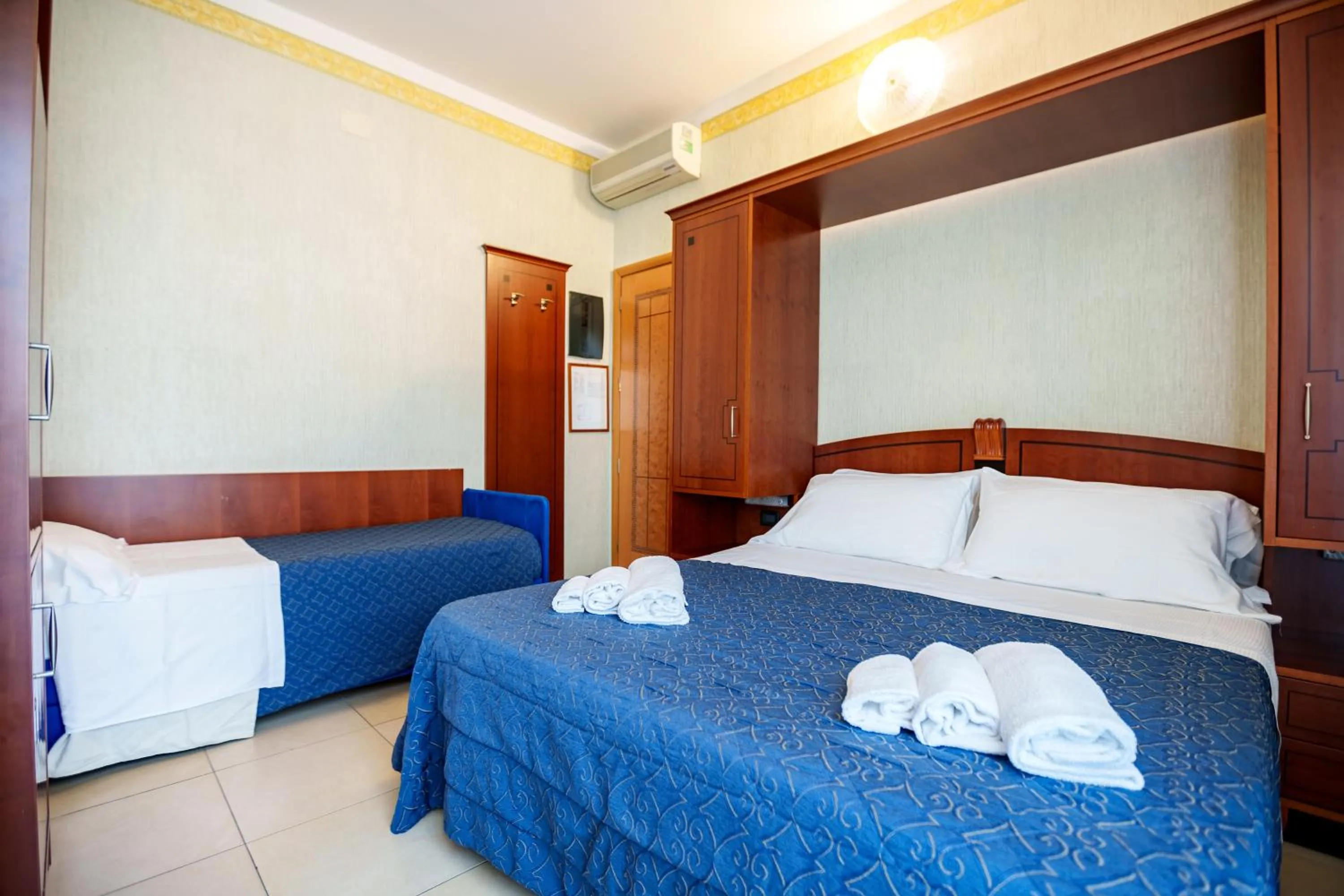 Bed in Hotel Rex Rimini