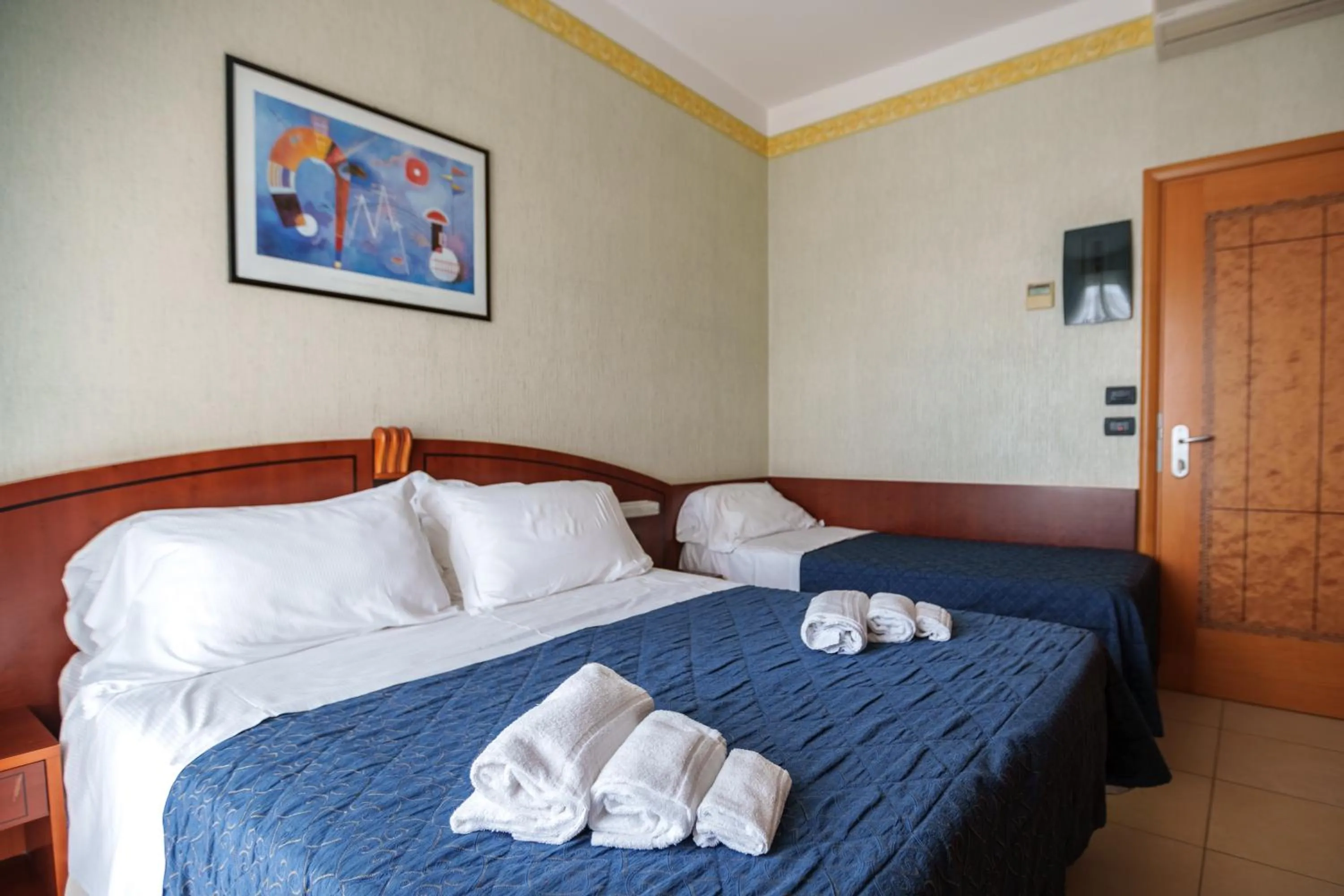 Bed in Hotel Rex Rimini