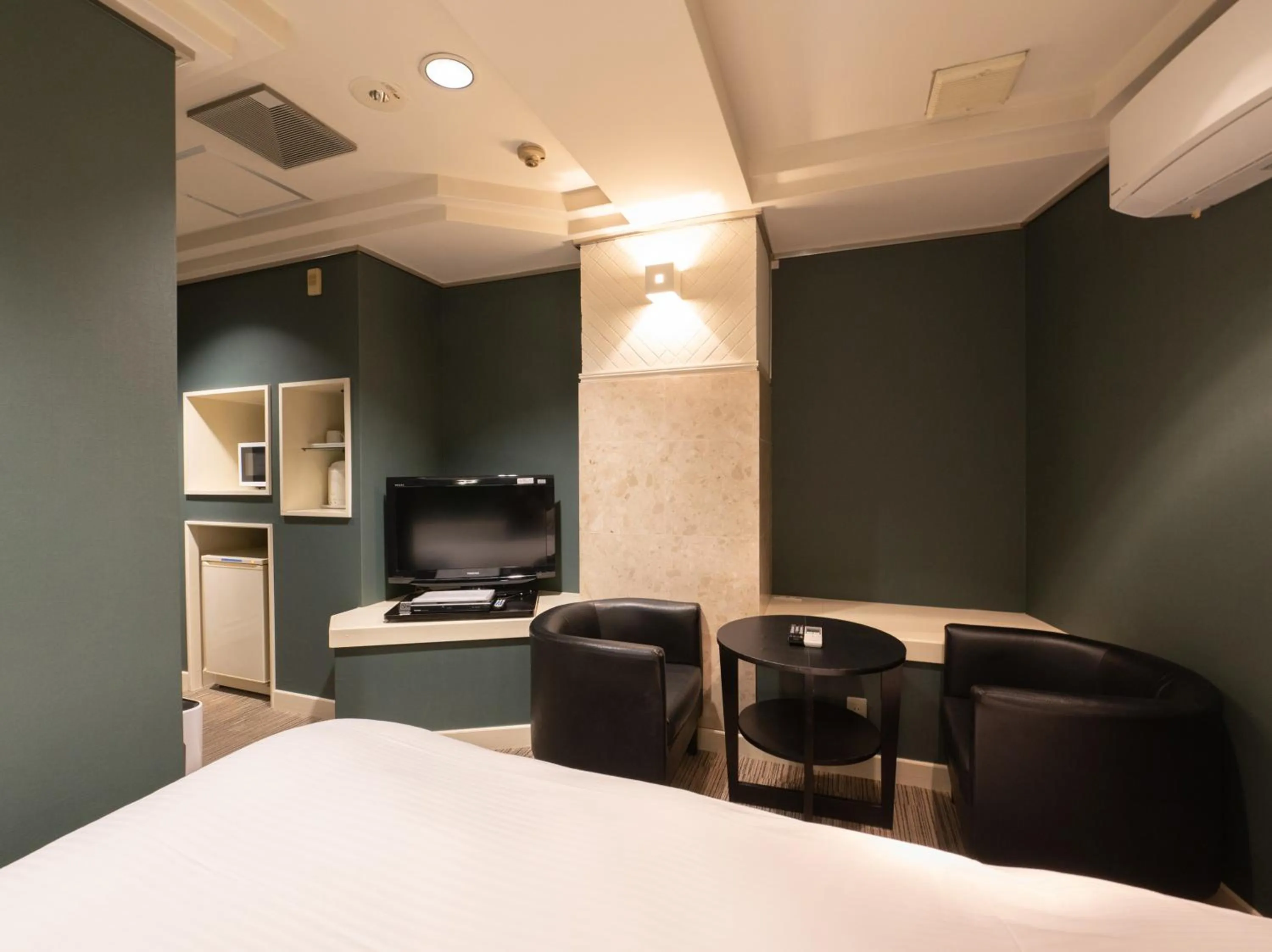 Bed in Tabist Hotel Rakuserina