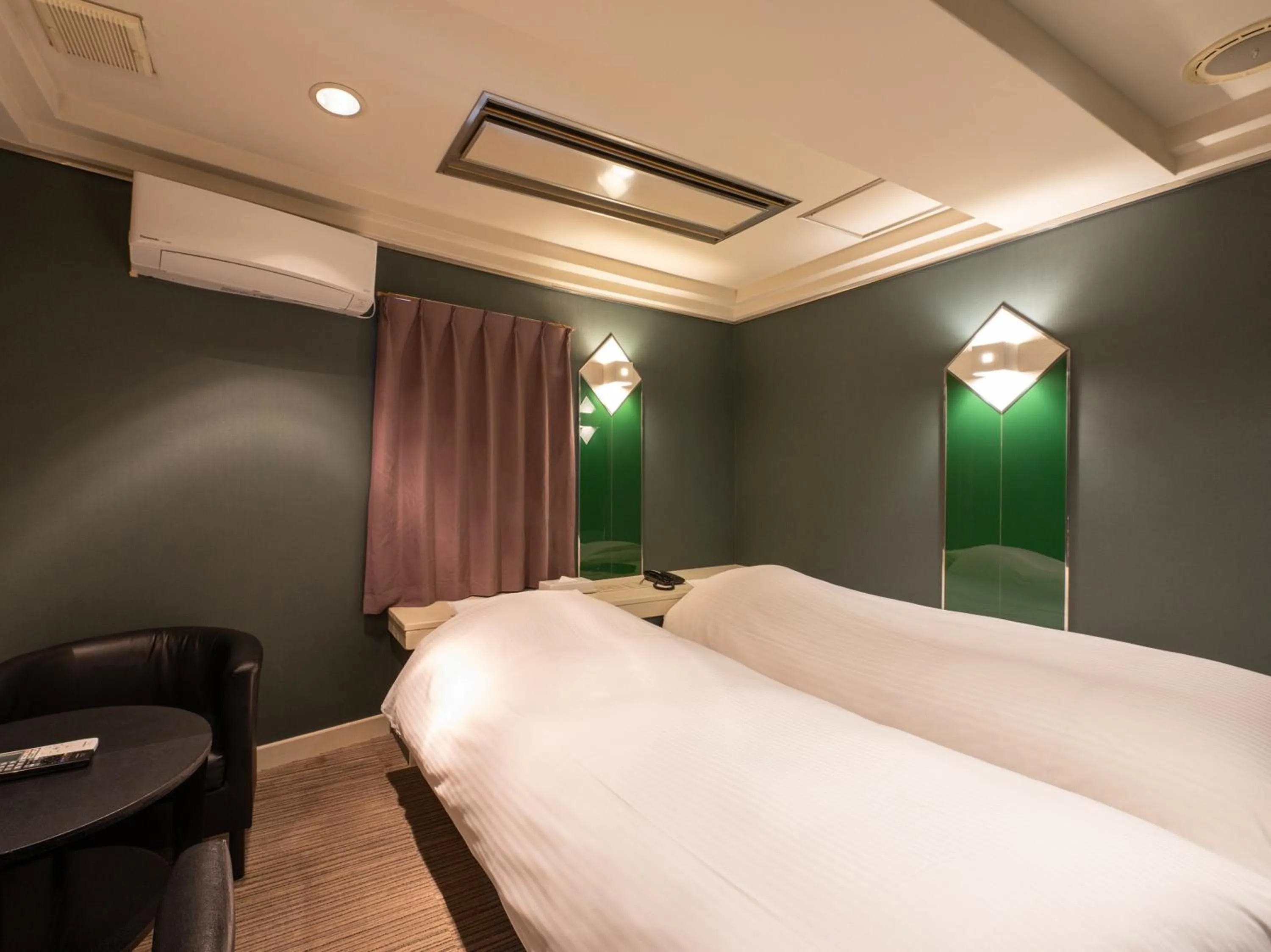 Bed in Tabist Hotel Rakuserina