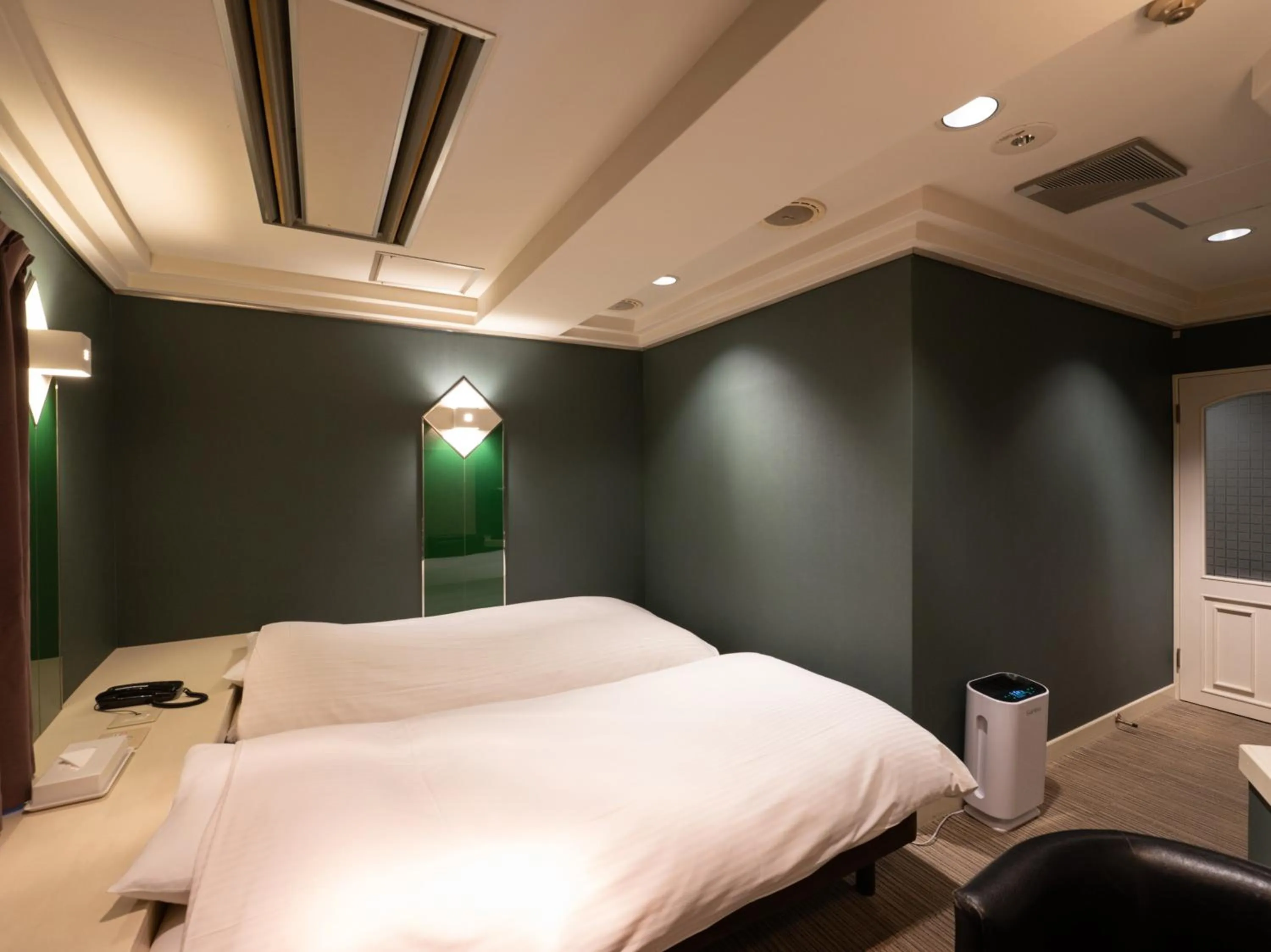 Bed in Tabist Hotel Rakuserina