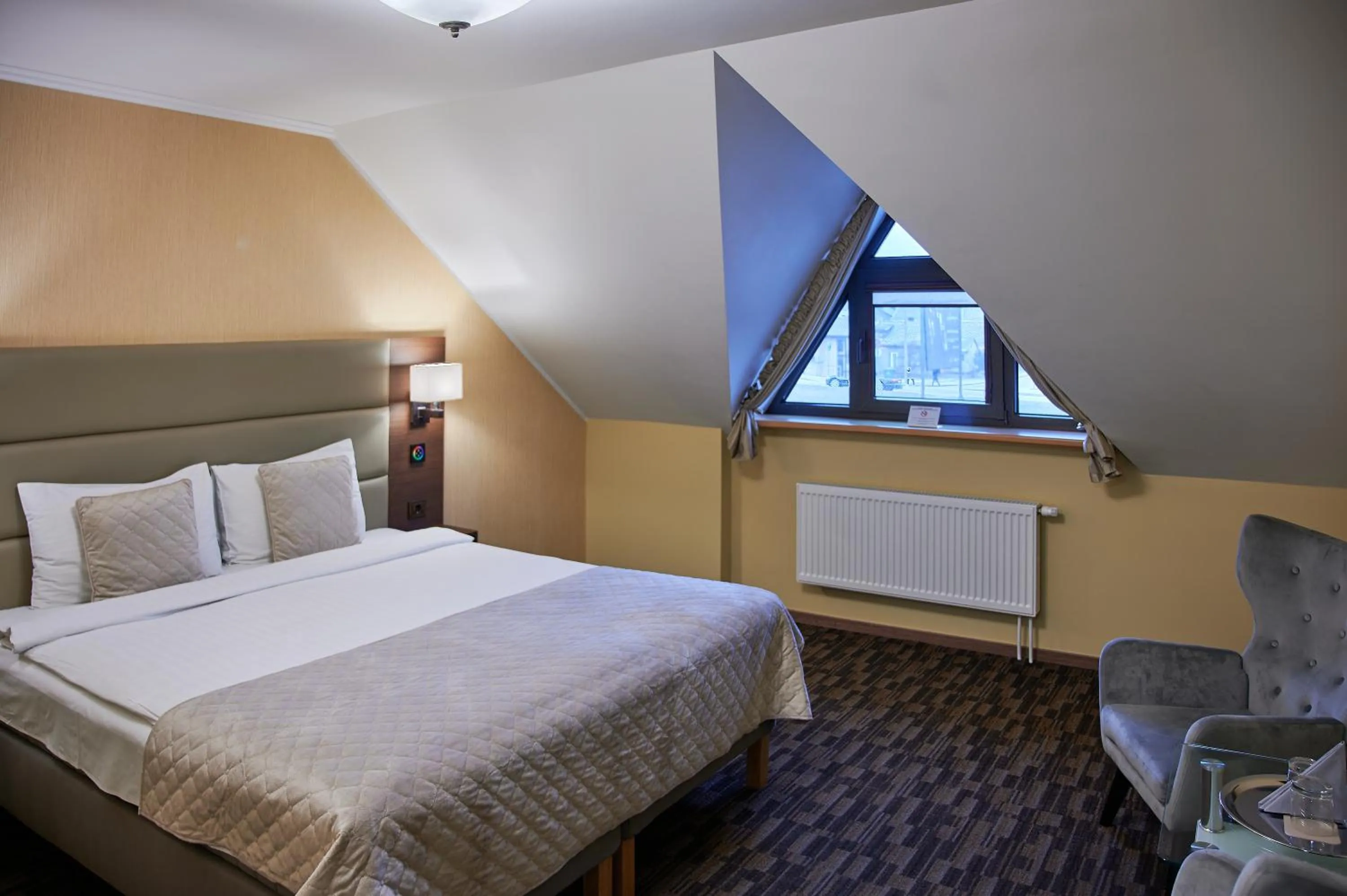 Bed in Olympus Hotel