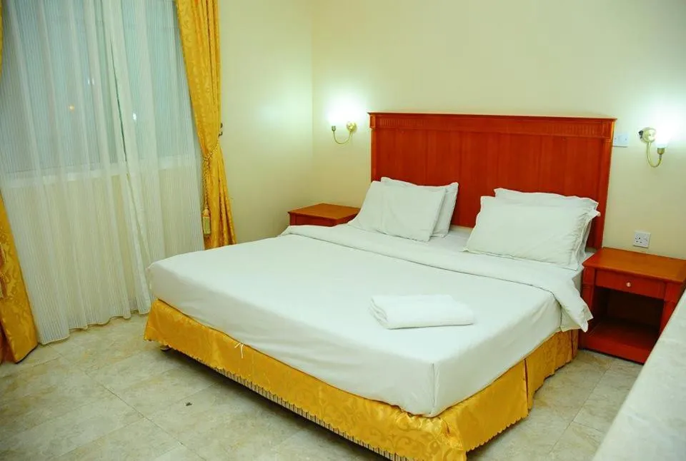 Bed in Al Faisal Hotel Suites