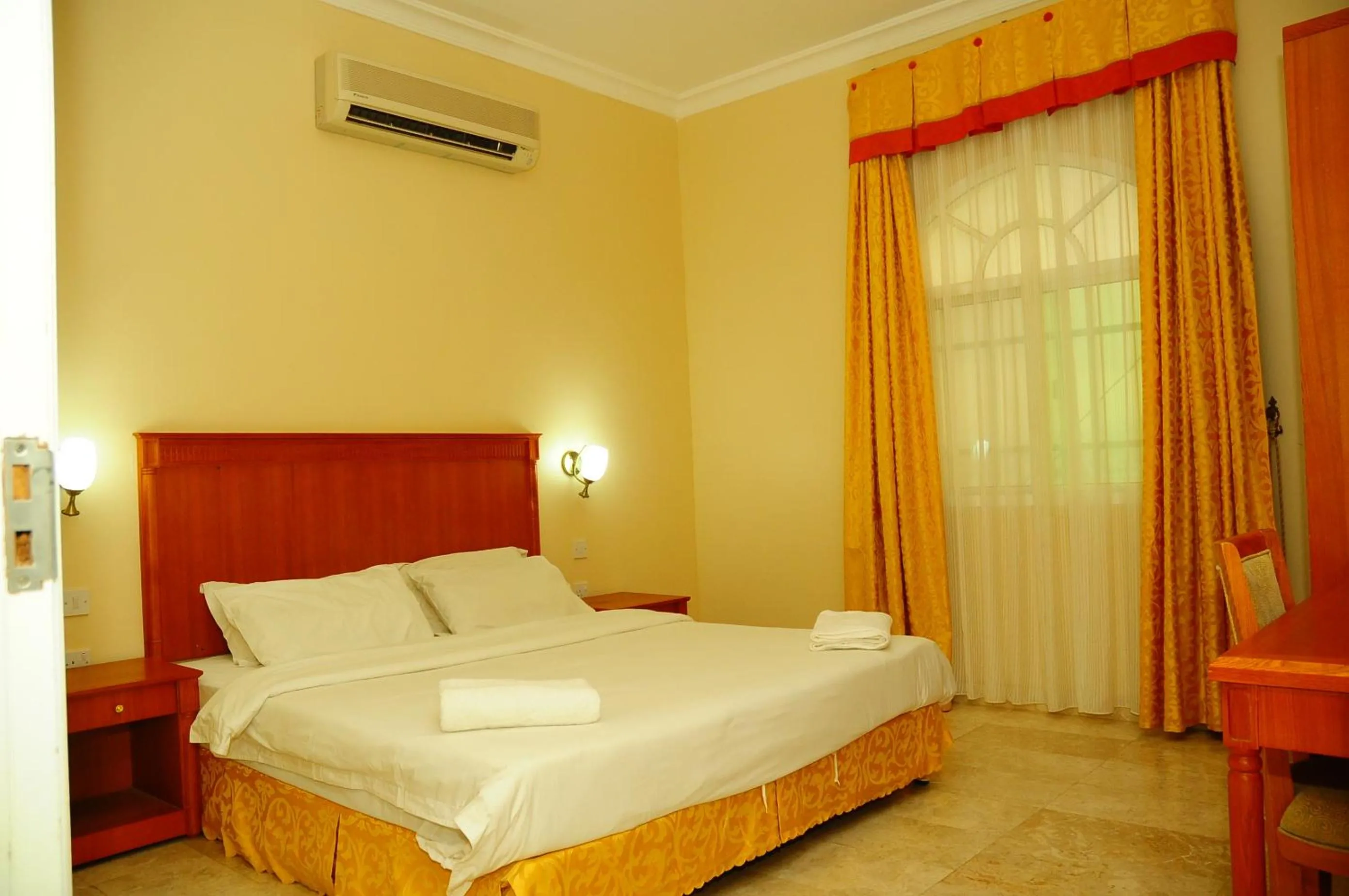 Bed in Al Faisal Hotel Suites