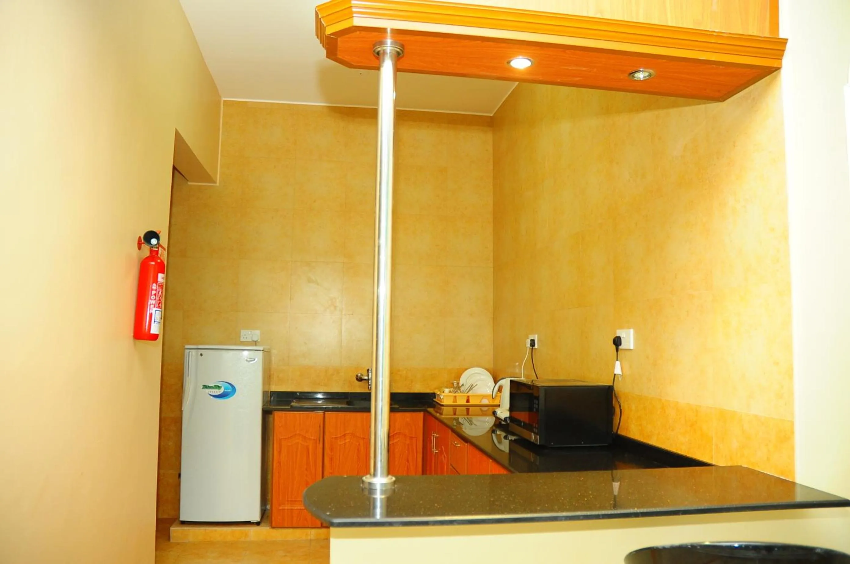 Kitchen or kitchenette in Al Faisal Hotel Suites
