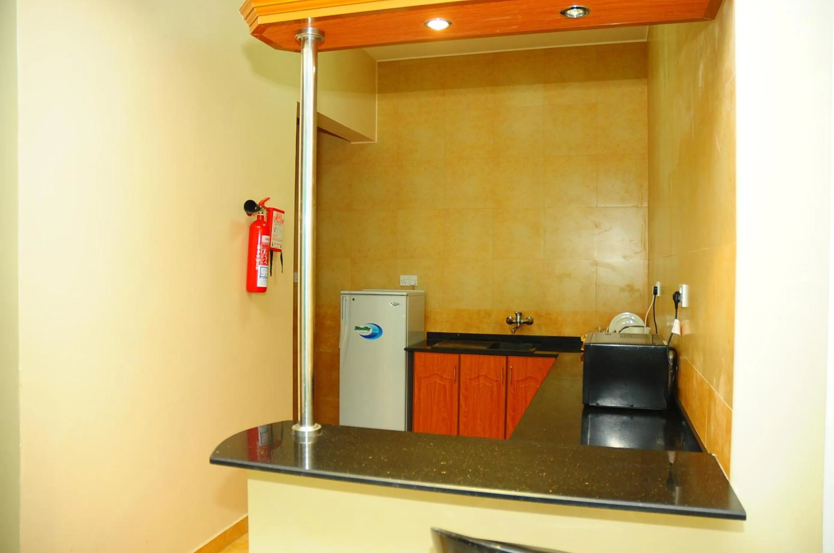 Kitchen or kitchenette in Al Faisal Hotel Suites